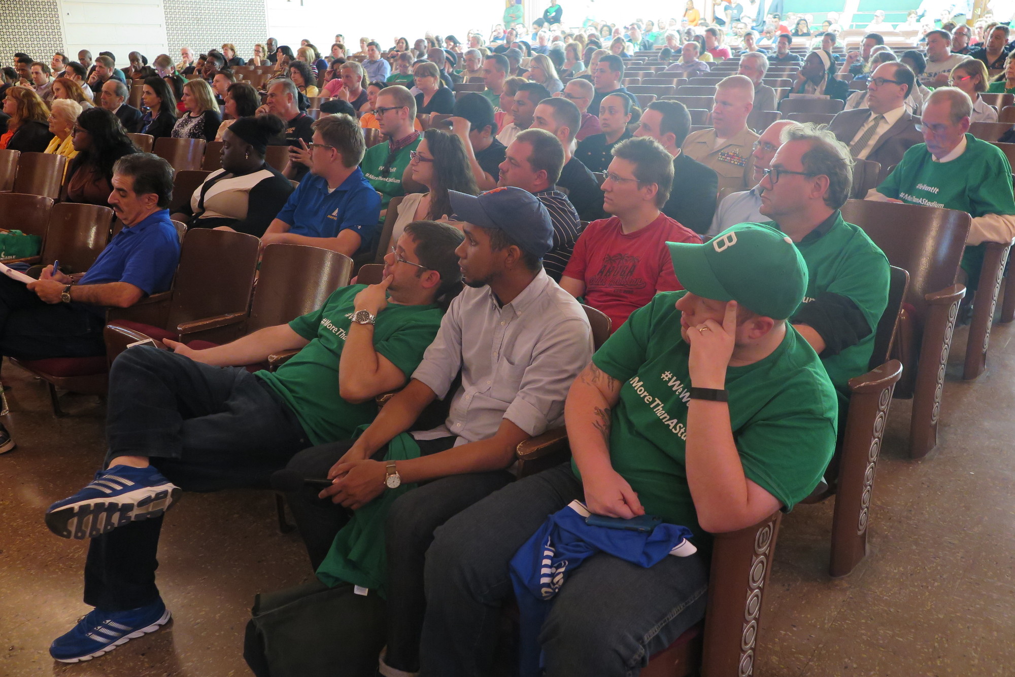 More than 200 residents of Elmont and surrounding communities attended the meeting, some wearing green shirts promoting the Cosmos’ stadium proposal.