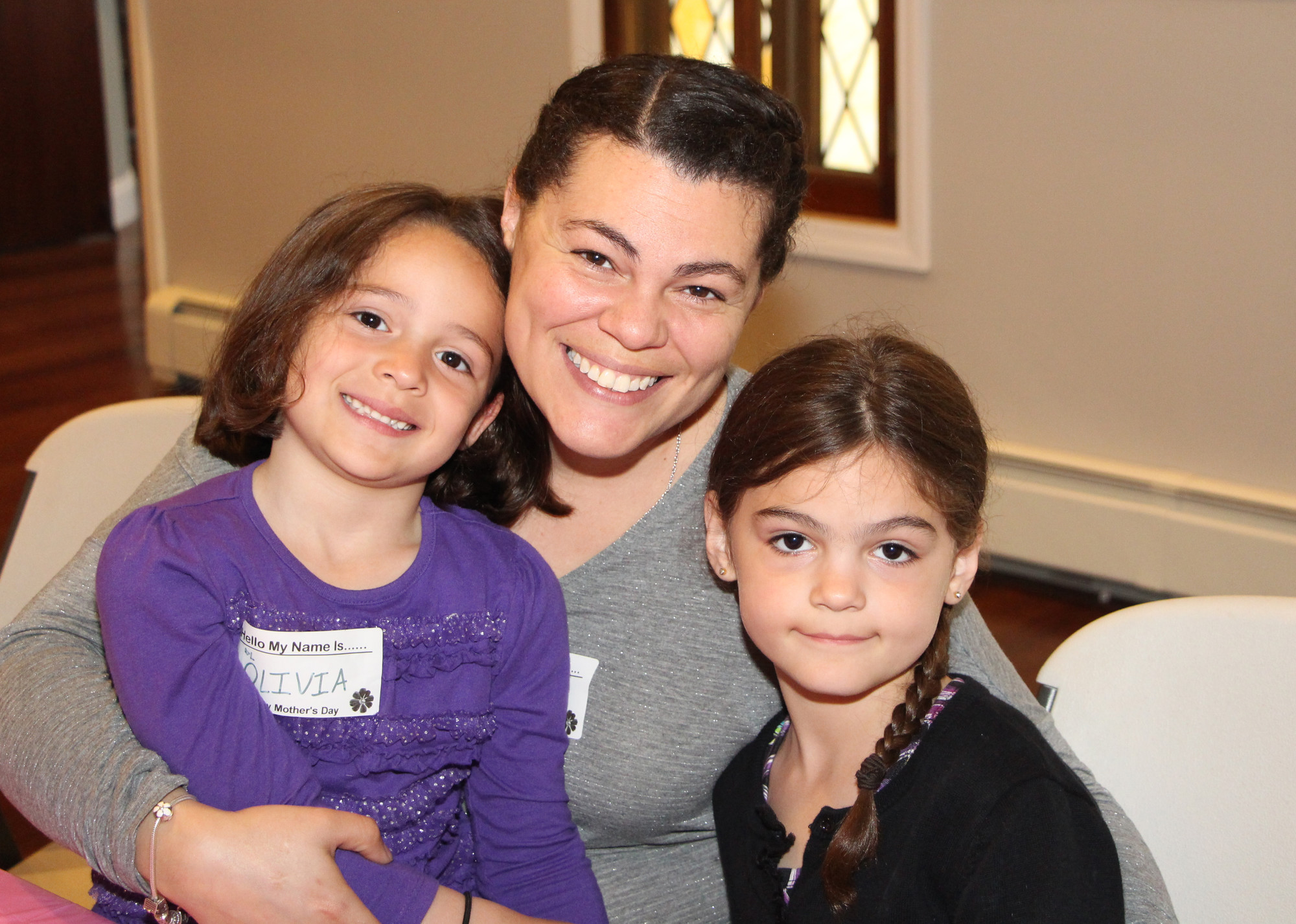 Mothers were treated to a nice meal at South Nassau Christian Church on Saturday, including Jessica Corchado and her children, Olivia, left, and Sophia.
