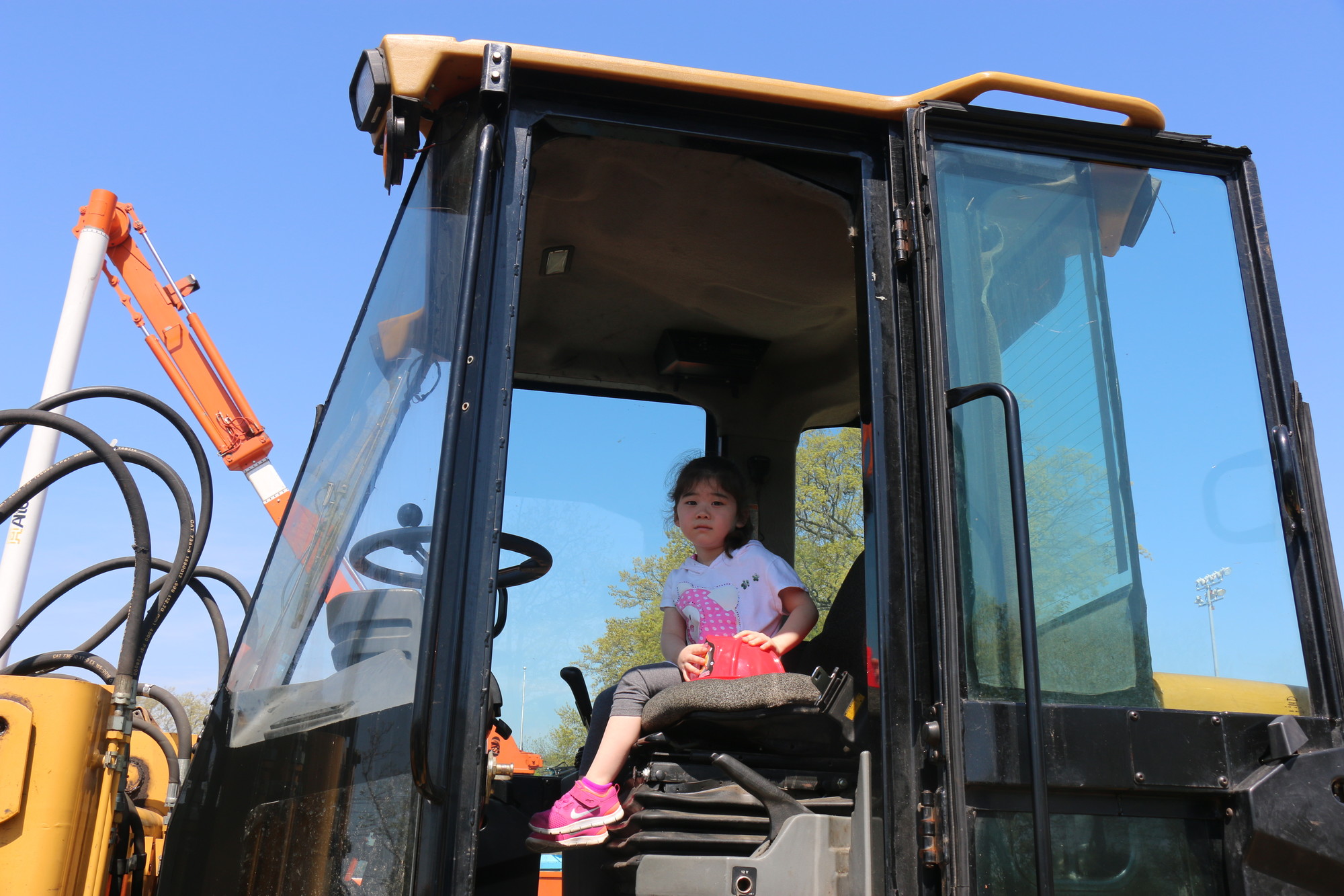 Dalia Park, 4, took in the view from the bulldozer’s cab.