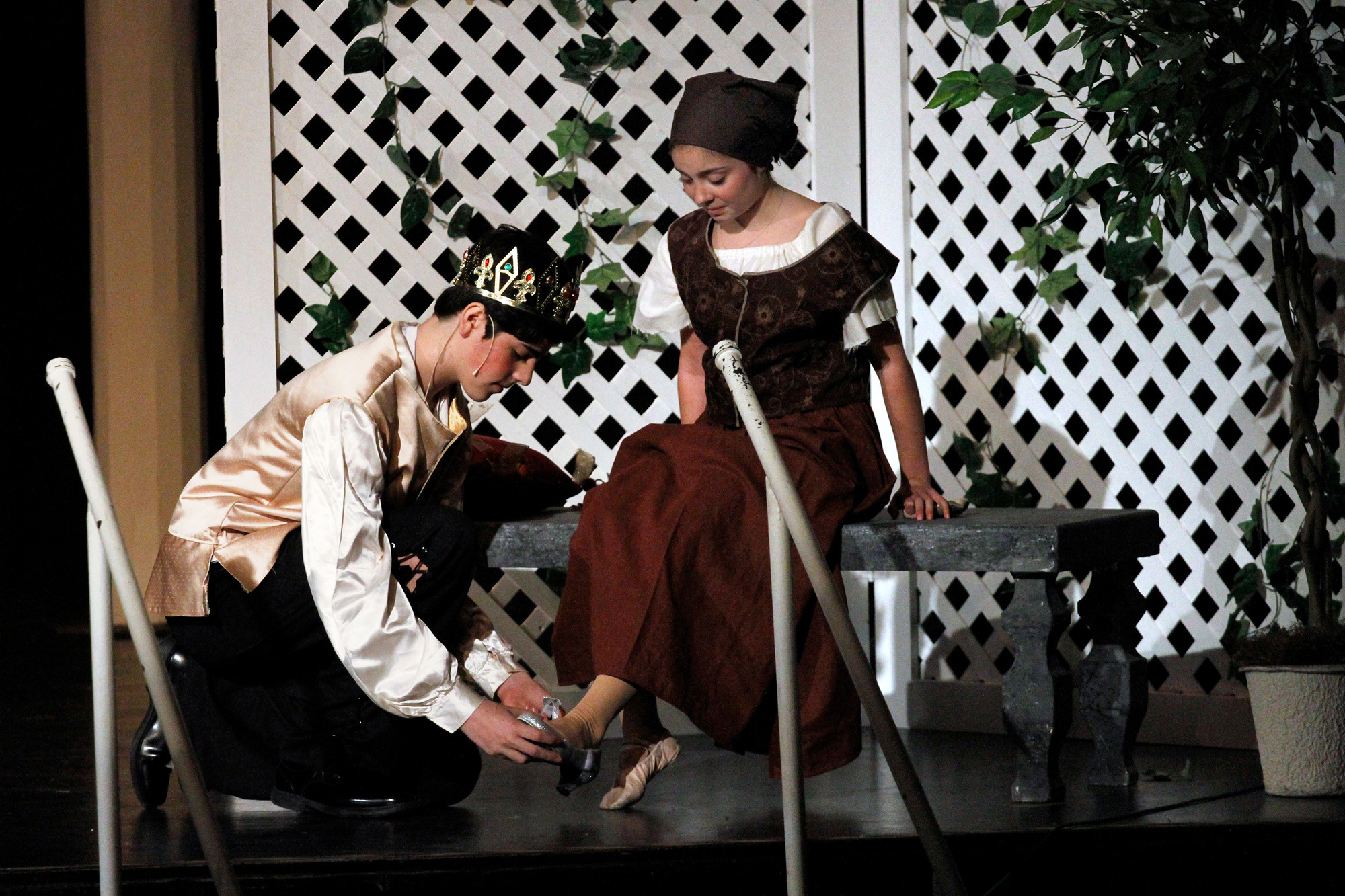 Nicholas Pandolfo as the Prince tries the glass slipper on Cinderella’s (Melissa Aliotta’s) foot.