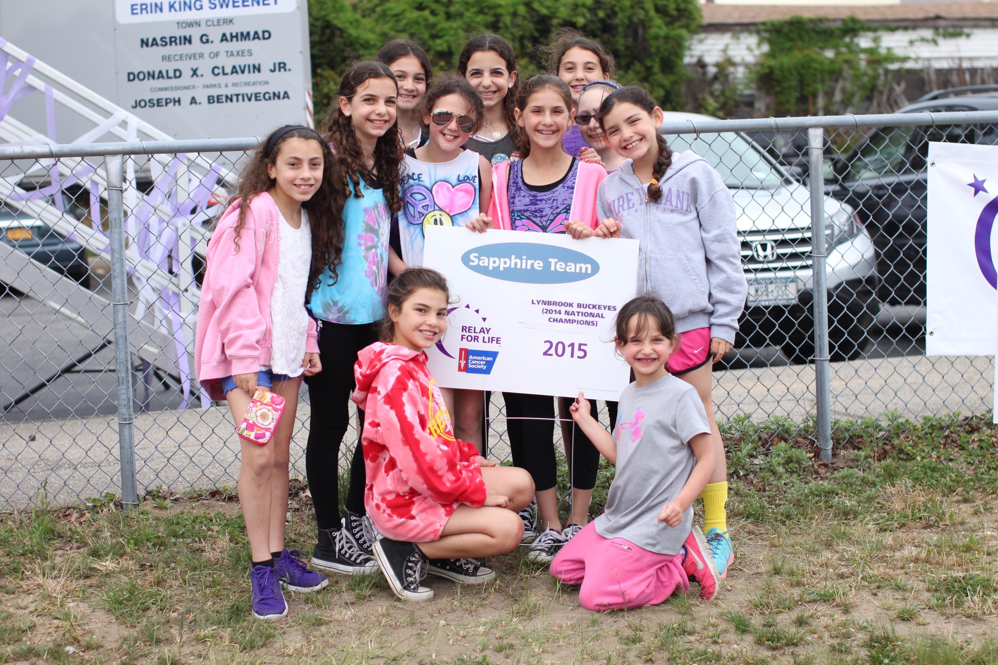 Members of the Relay for Life team "Lynbrook Buckeyes (2014 National Champions)" helped raise over $19,000 for the American Cancer Society.