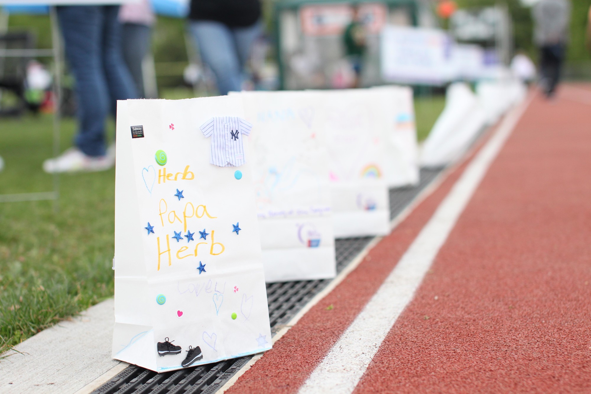 Luminaria bags lined the South Middle School track.  Each one is dedicated to someone who has battled or is currently battling cancer.