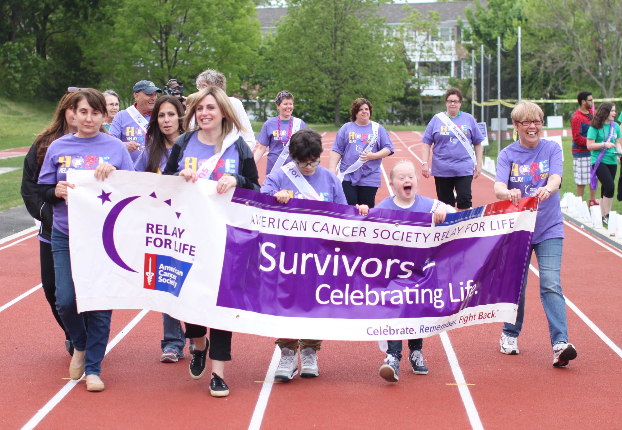 The survivors happily make their first lap around the track at Lynbrook's South Middle School.