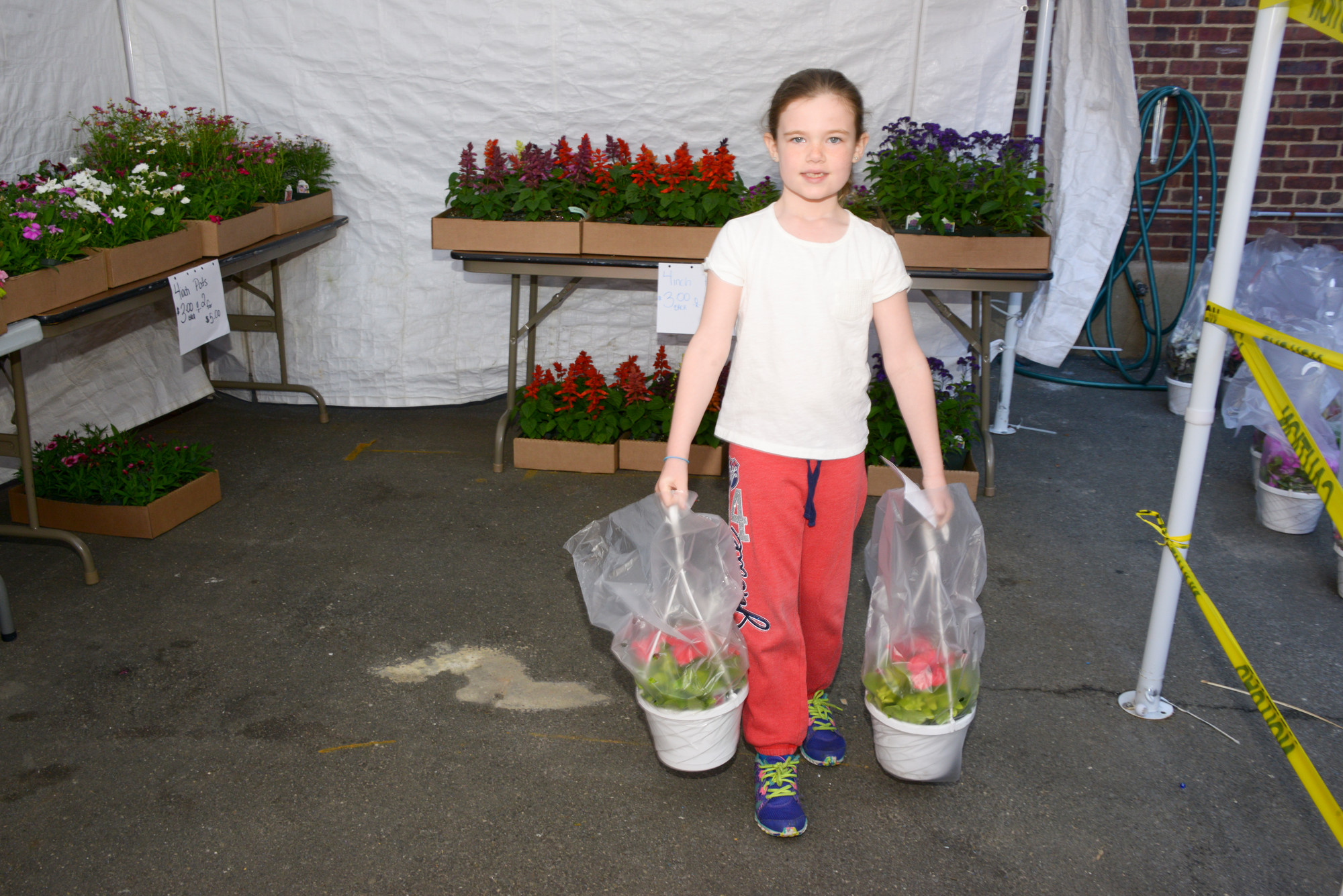 Kayla McDonough shopped for Mother’s Day plants at the Hegarty school plant sale in Island Park.