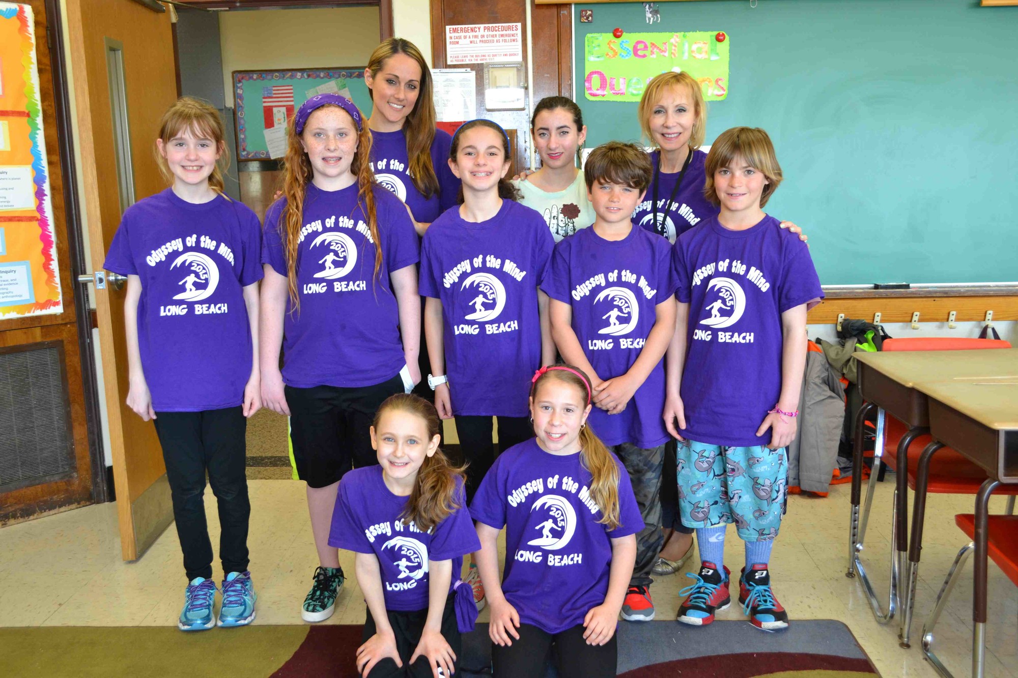 Front kneeling, Maryn Ascher, left, and Gabrielle Pine along with standing teammates Ariana Thomas, left, Sarah Gusler, Samantha Breen, Matthew O’Connor and Skyler Oberlander and their instructors Dr. Caitlin Fuentes, left, high school student volunteer Charlotte Kasper and Beverlee Bertinetti.