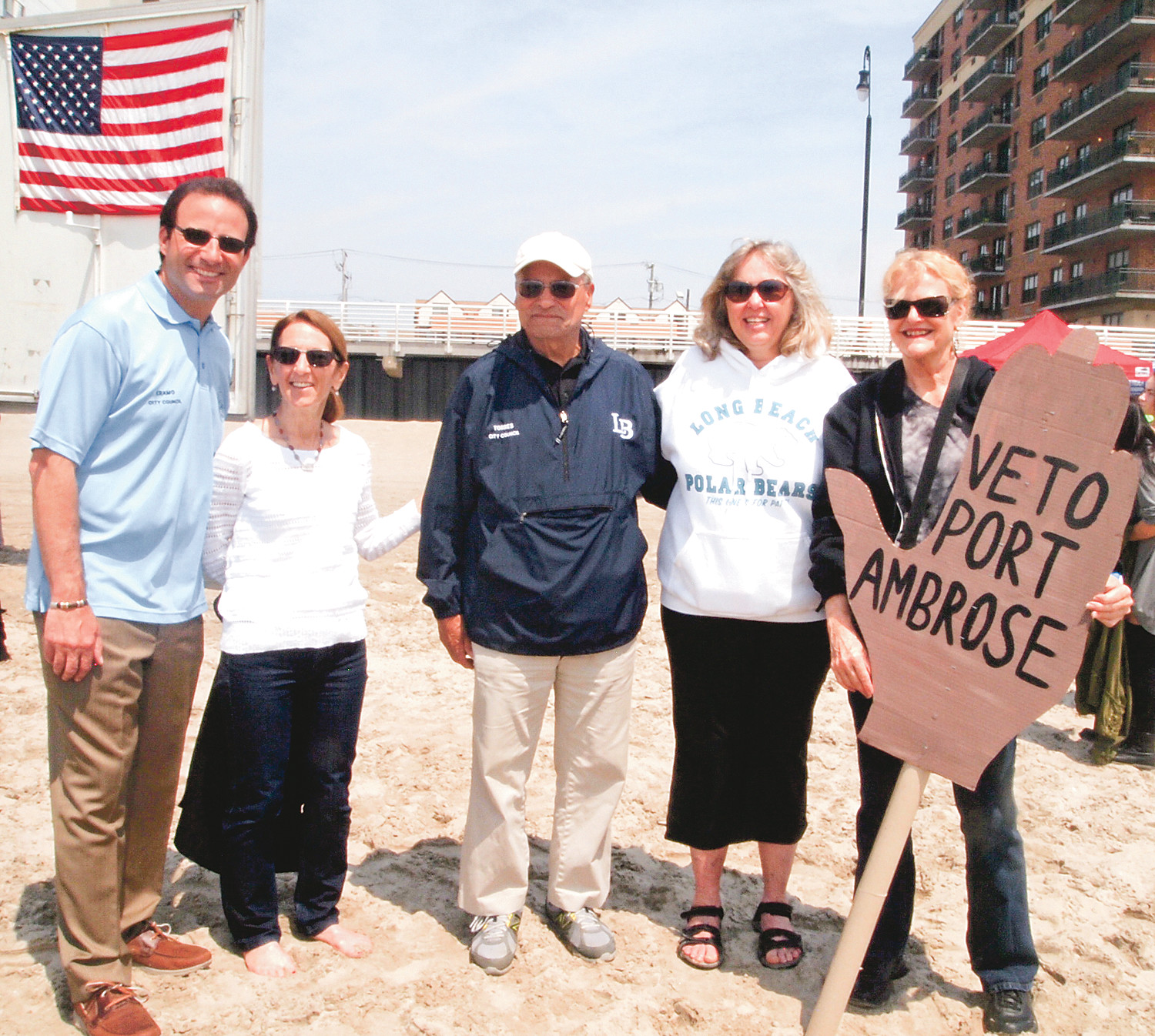 City Council member Anthony Eramo, left, Council Vice President Fran Adelson, Council President Len Torres, County Legislator Denise Ford and Johanna Mathieson or Artists-in-Partnership, Inc. protested the proposed LNG facility. 