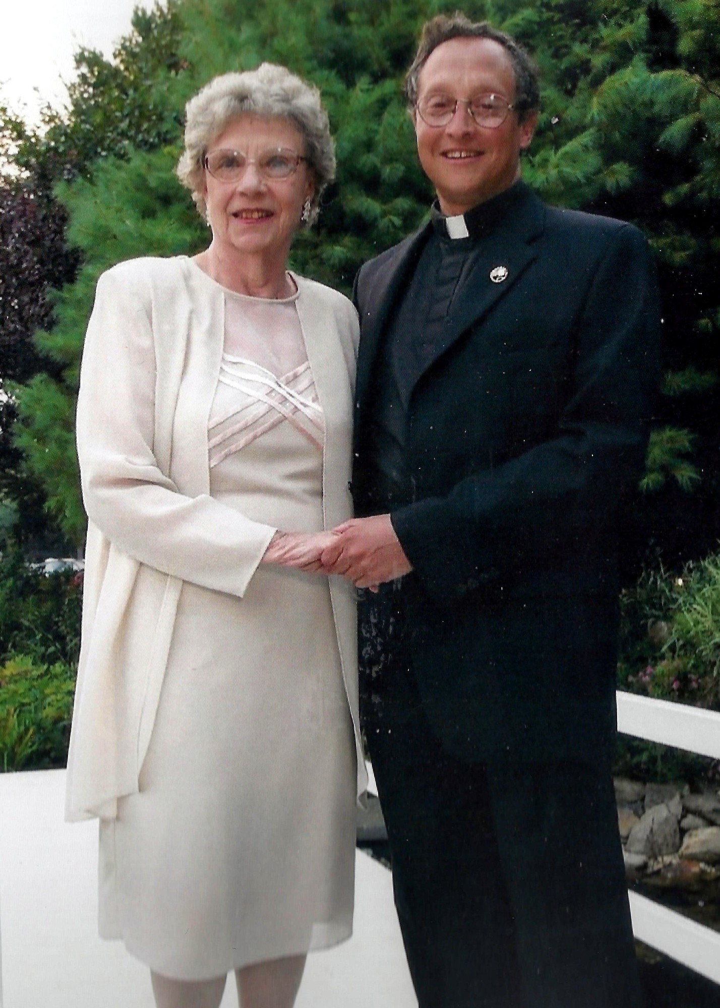 father frank with his mother in an undated family celebration.