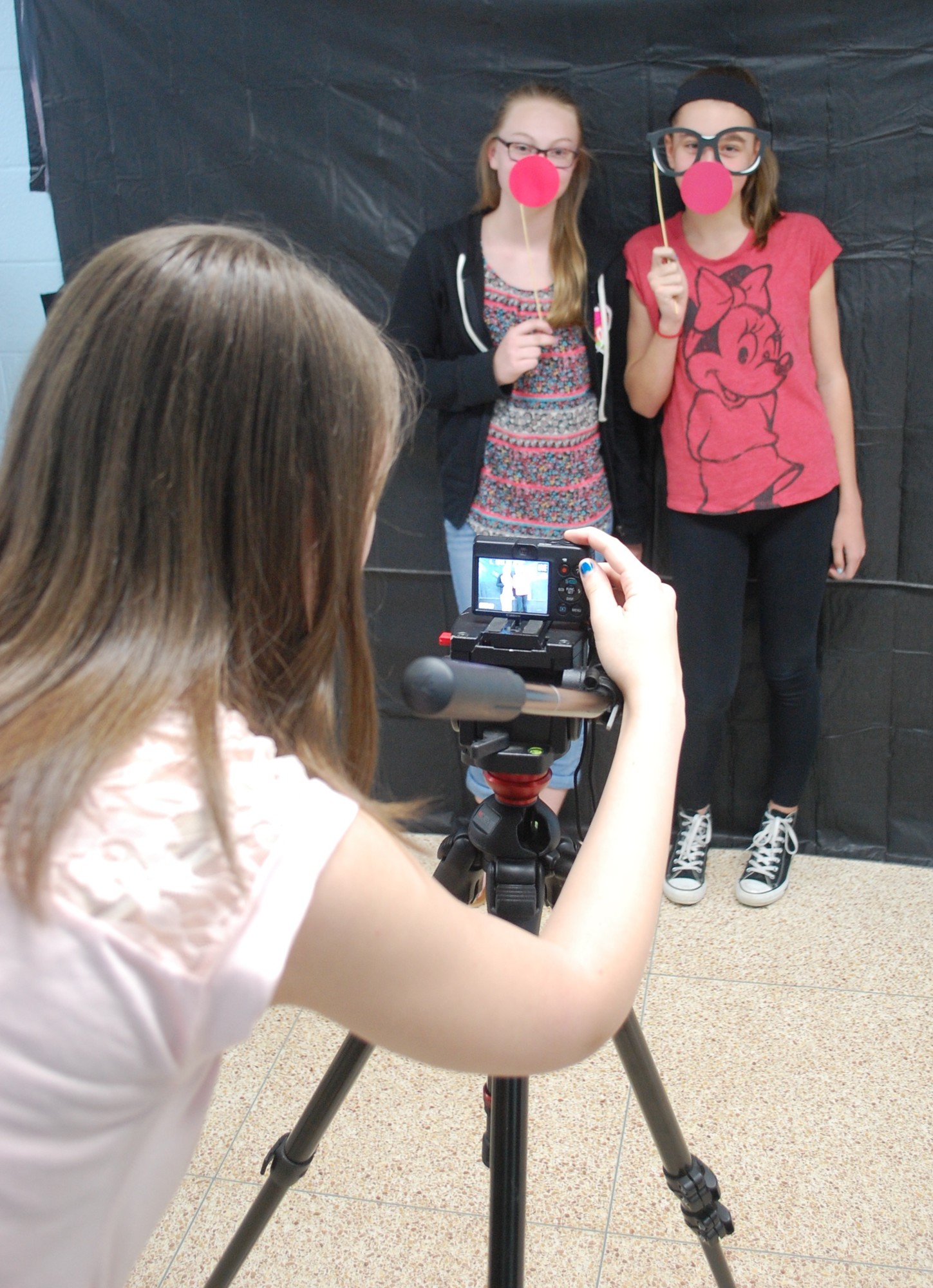 Student Council members Kaitlin Steingruebner, left, and Laura Keltan had their photo taken for the slideshow.