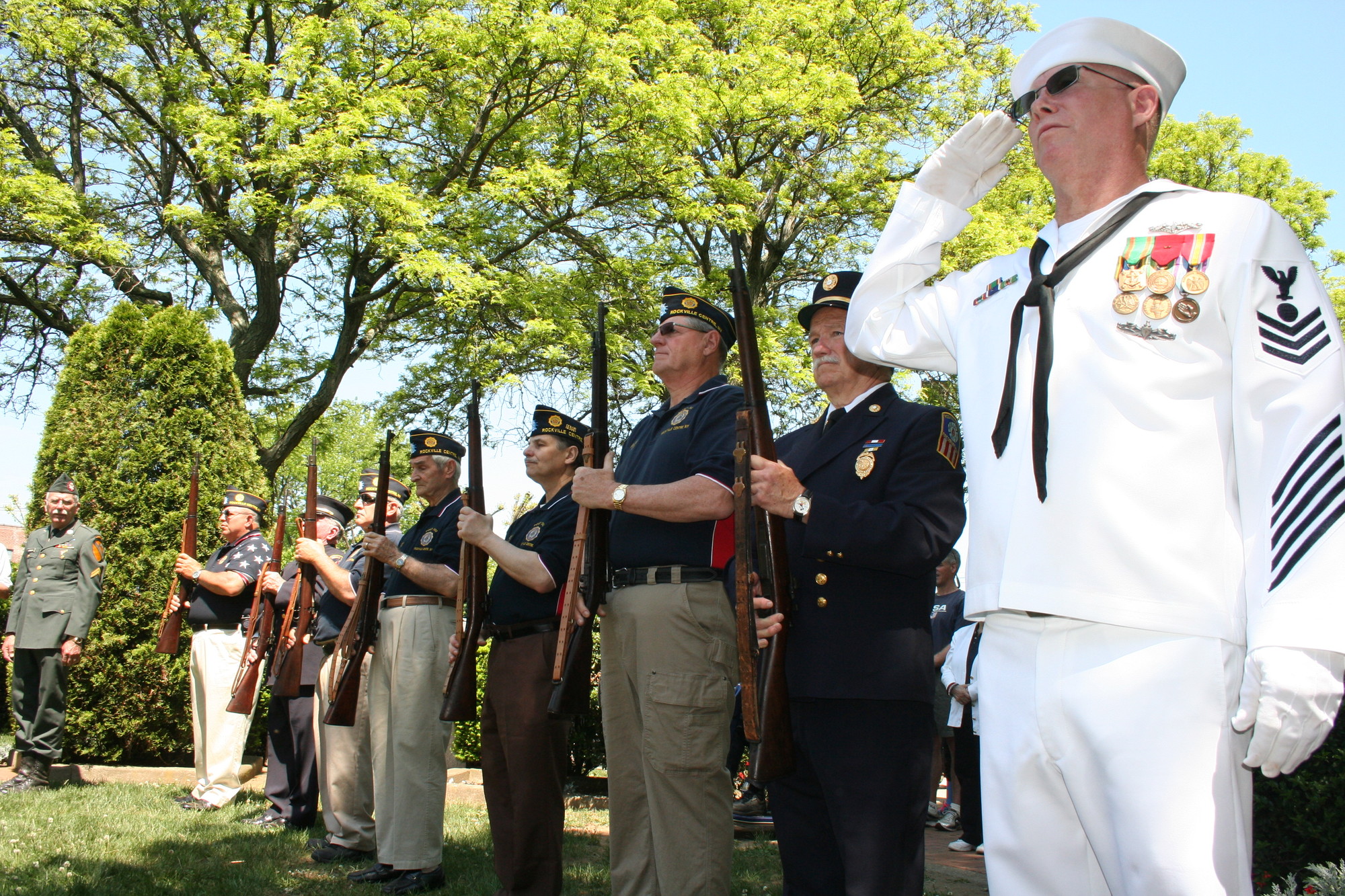 Local veterans led a 21-gun salute in honor of soldiers from Rockville Centre who perished while fighting in our nation’s wars.