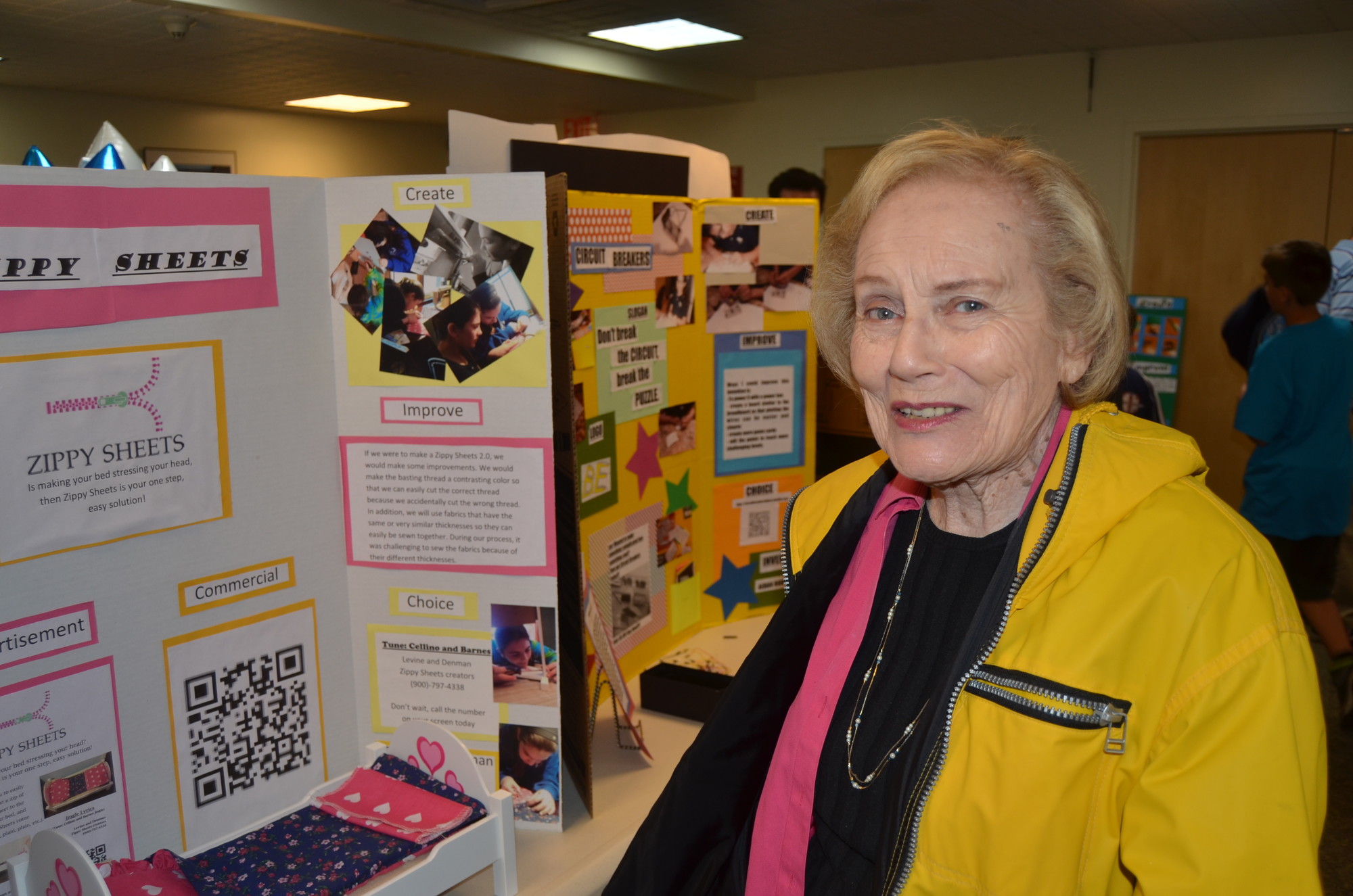Florence Mensch, Oceanside Library Trustee checking out the exhibits.