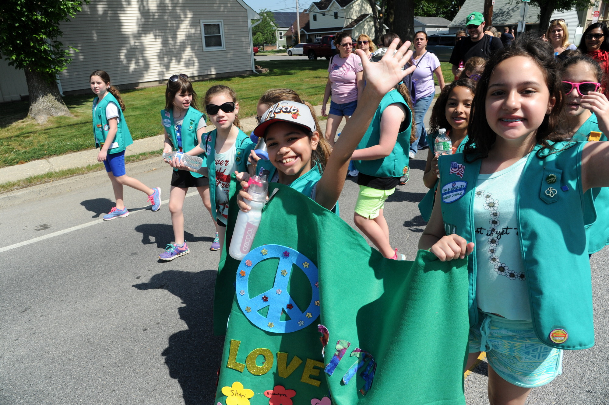 Dozens of local Girl Scout troops took part in the parade procession.