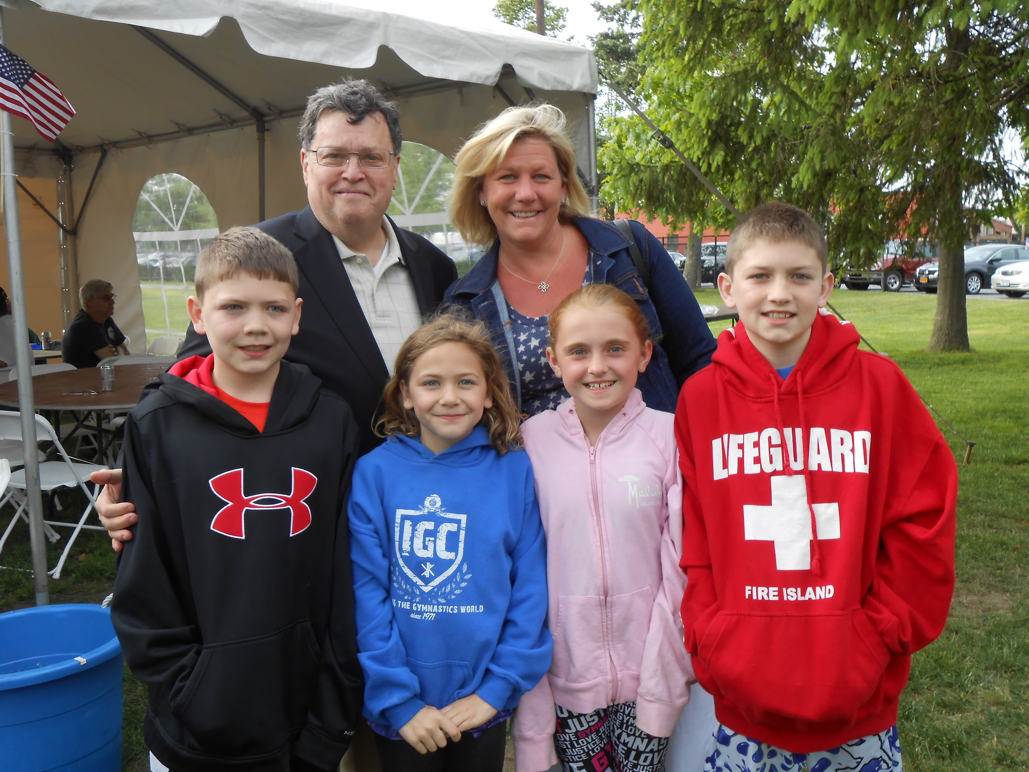 Mayor Bill Hendrick greeted resident Mary Anne Readon. With them, from front left, were Keith and Grace Reardon, Olivia Guerriere, and Matthew Reardon.