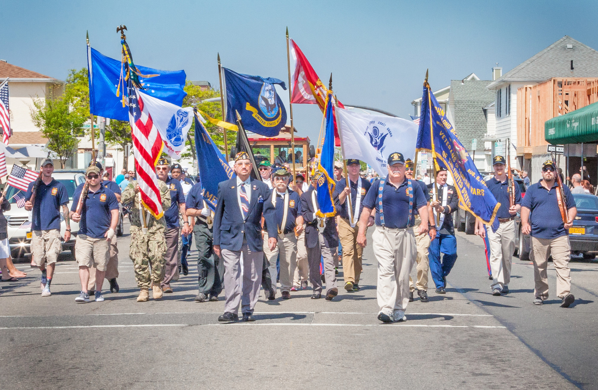 Commander Dan McPhee, right, led members of the VFW Post 1384 during the Memorial Day Parade on May 25, where officials and residents paid tribute to the sacrifices made by the men and women of the U.S. armed forces.