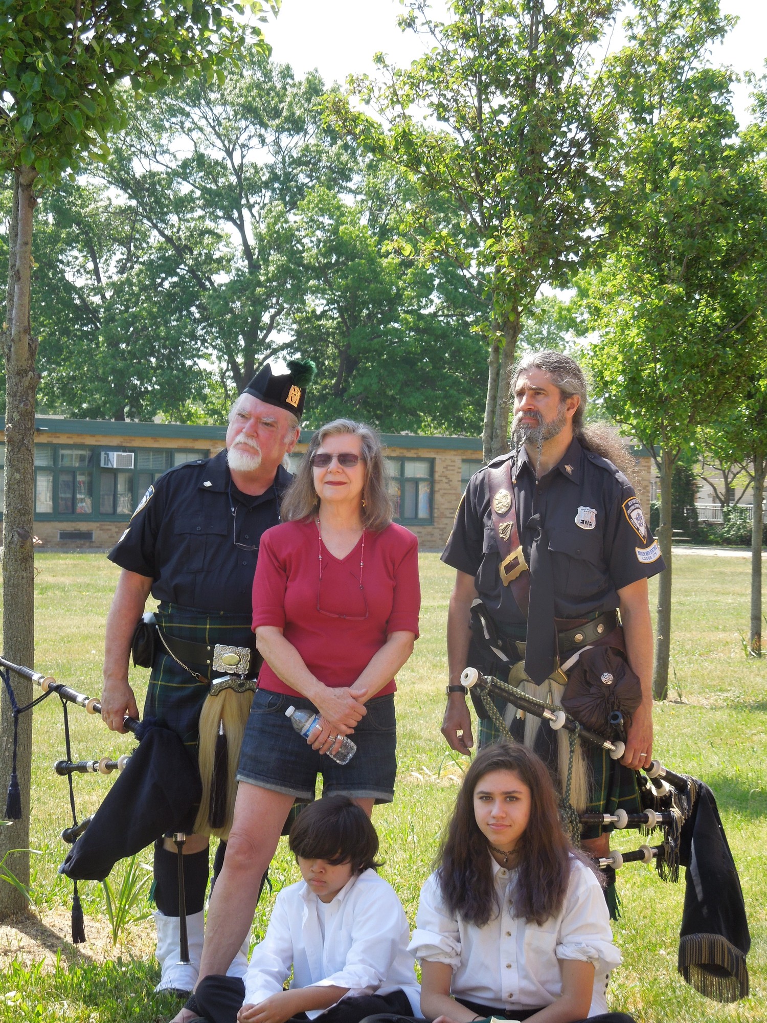 William Sneddon, Margaret Sneddon and Jerry Dixon, standing, along with Peter Ceron and Chloe Dixon. William Sneddon and Jerry Dixon are members of the New York State Irish War Pipe Band and play with the Seaford Fire Department.