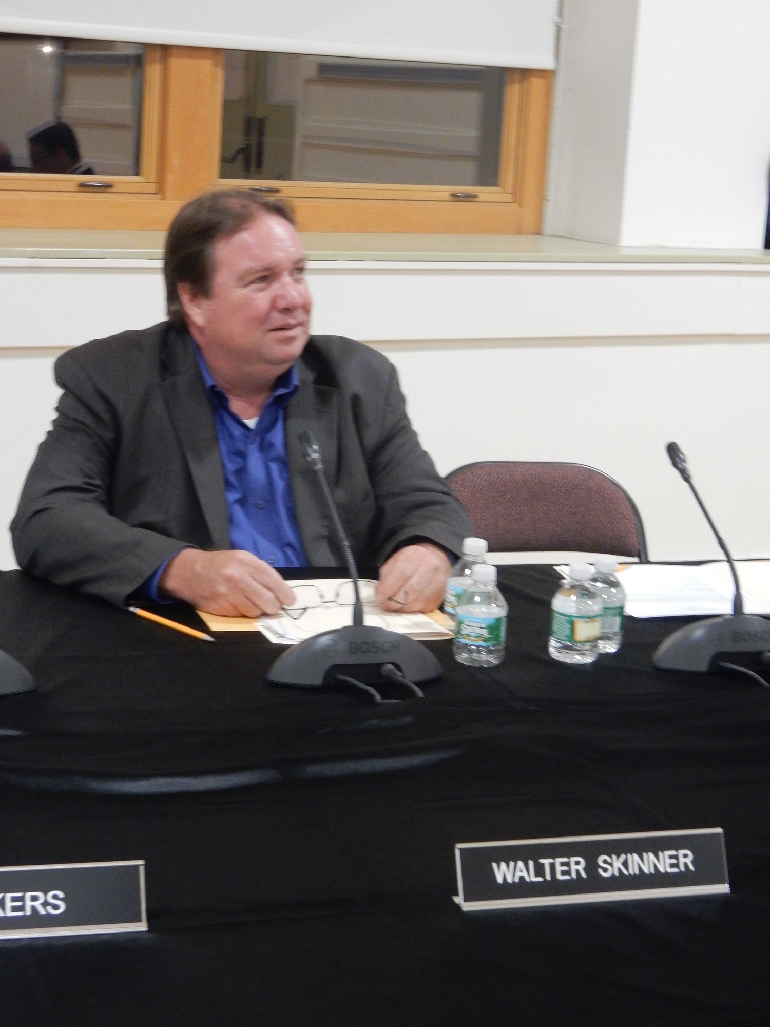 Walter Skinner, a Board of Education trustee since 2006, who will relinquish his seat at the end of the school year, received a standing ovation from the audience at last week’s board meeting.