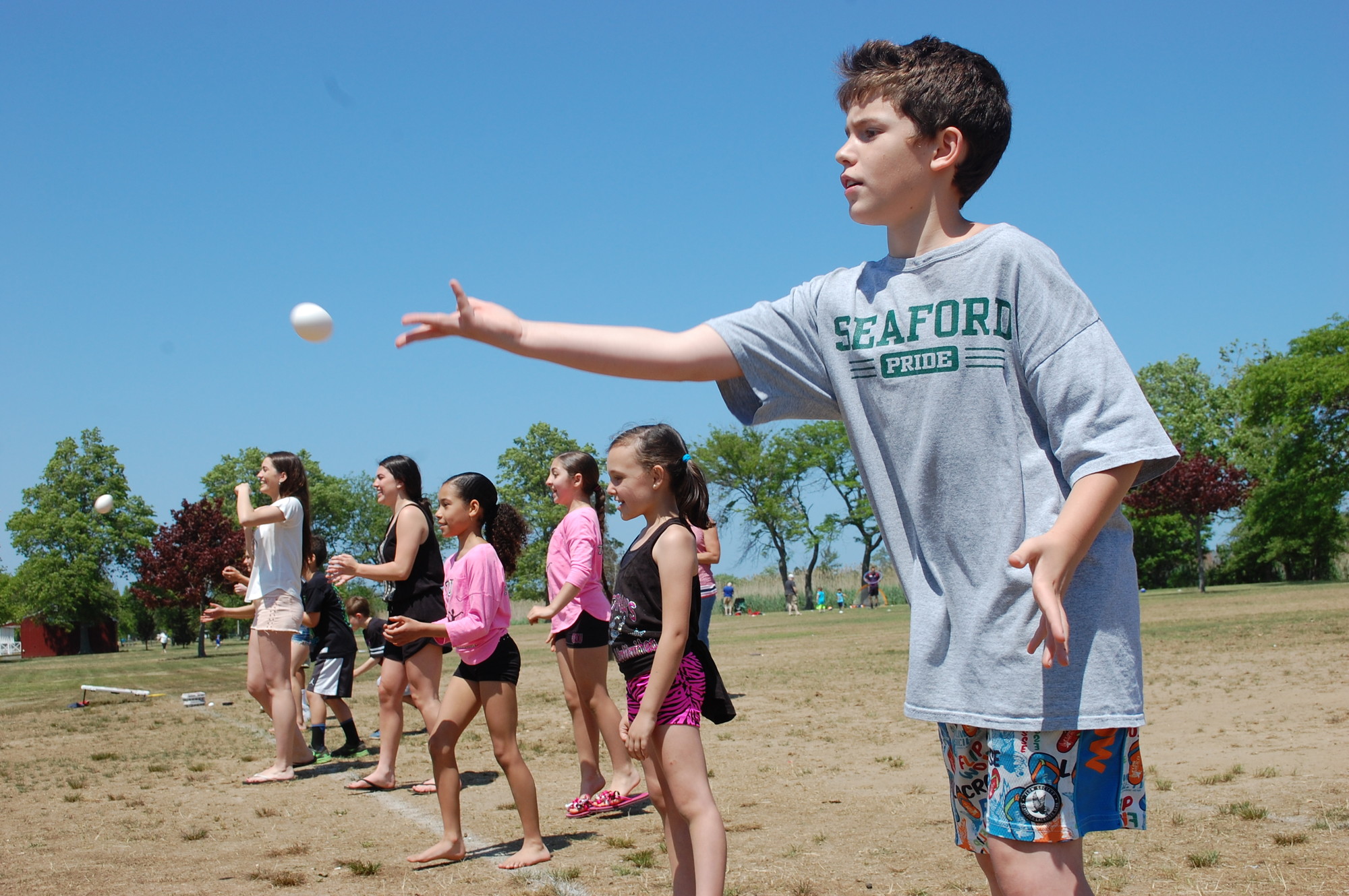 Max Schertz, 10, took part in the egg toss, one of the games organized by the Wantagh Kiwanis Club.