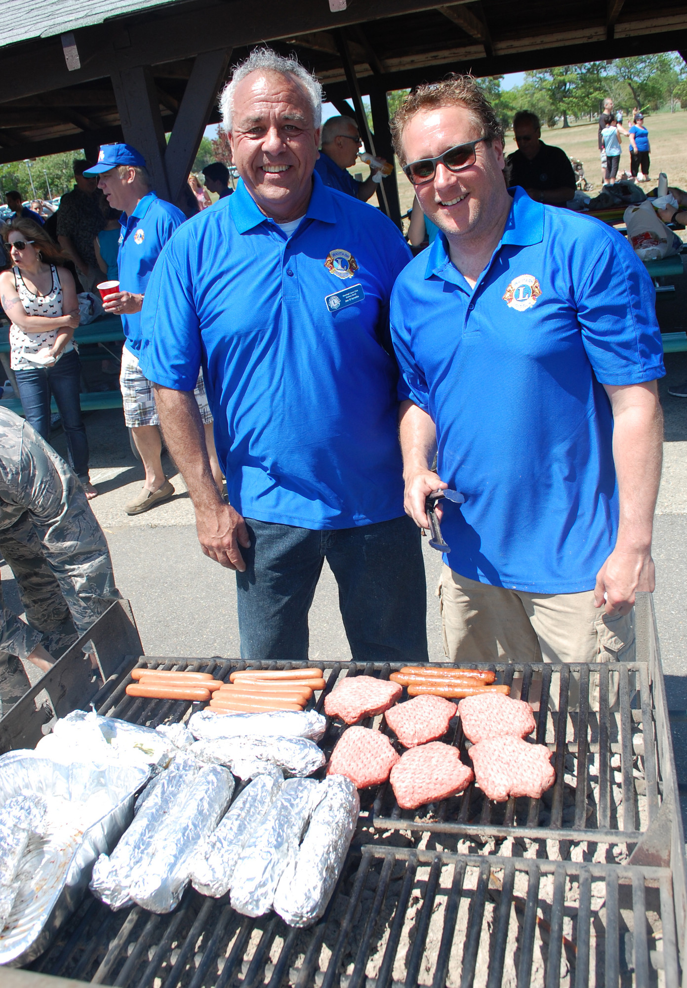 Lions Club members Joe D’Amelio, left, and Michael Motschwiller had the grill going.