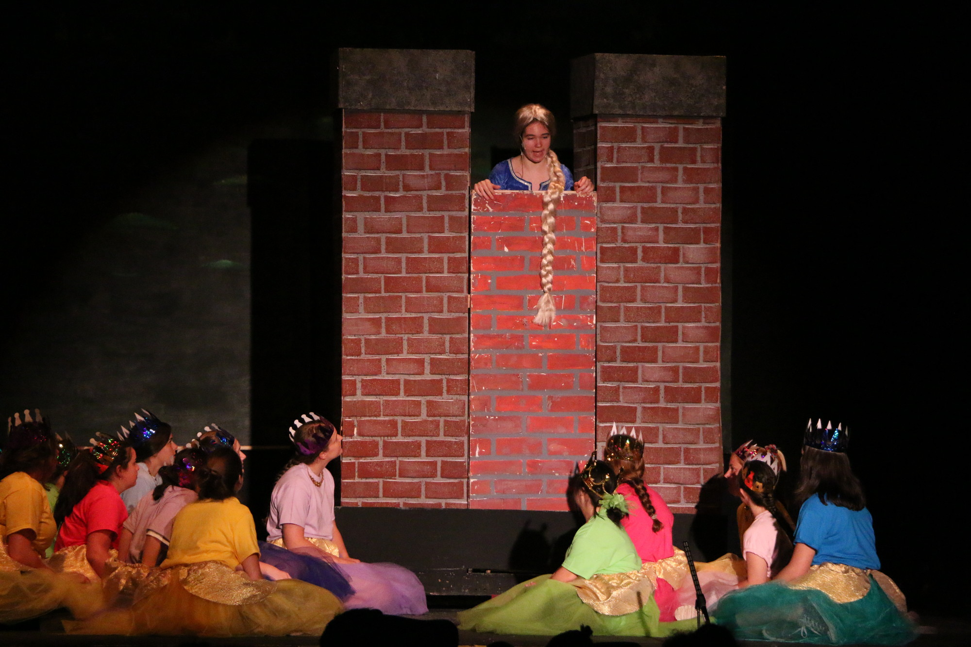 Rapunzel, played by Kyra Ganci-Barnes, sang to fellow princesses about being trapped in a tower.