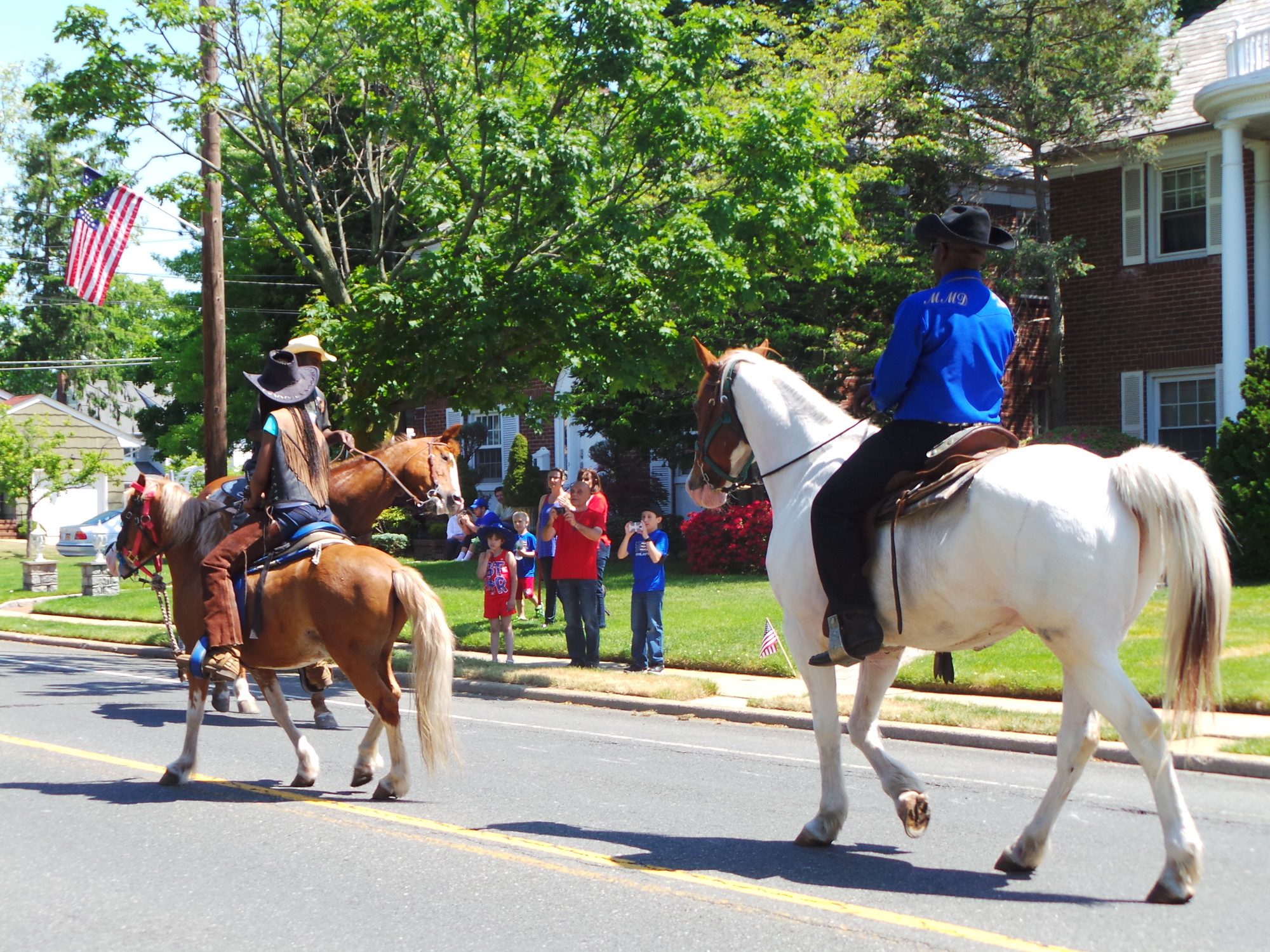 A group of six riders from the Federation of Black Cowboys participated in the parade.