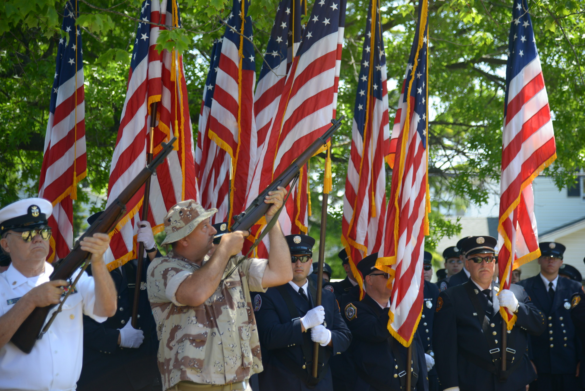 Veterans Offer a traditional gun salute.