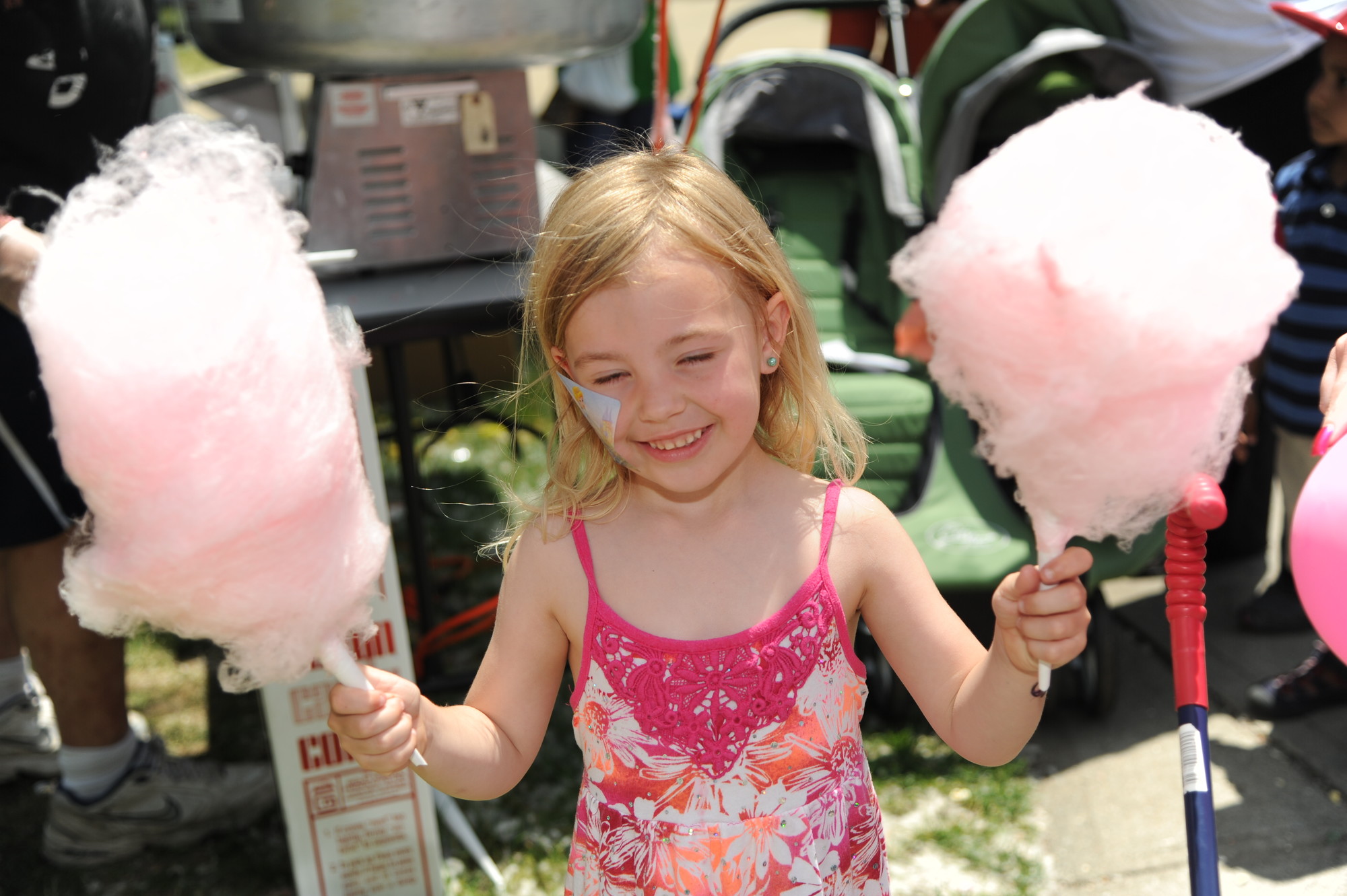 At Pride Day, residents enjoy fun activities with their neighbors. Above, 4-year-old Peyton Chester enjoyed one of the sweeter items offered at last year’s event.