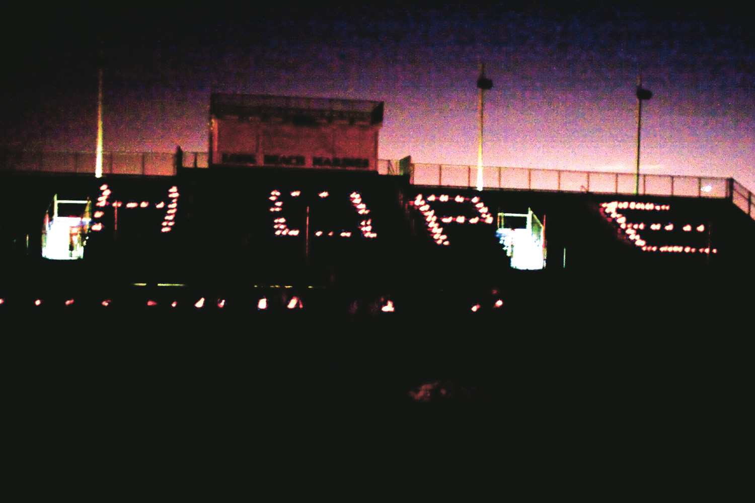 Photos by Rebecca Rogak/ HeraldAs part of the Luminara Ceremony, candles spelling out the word HOPE glowed brightly on the bleachers.
