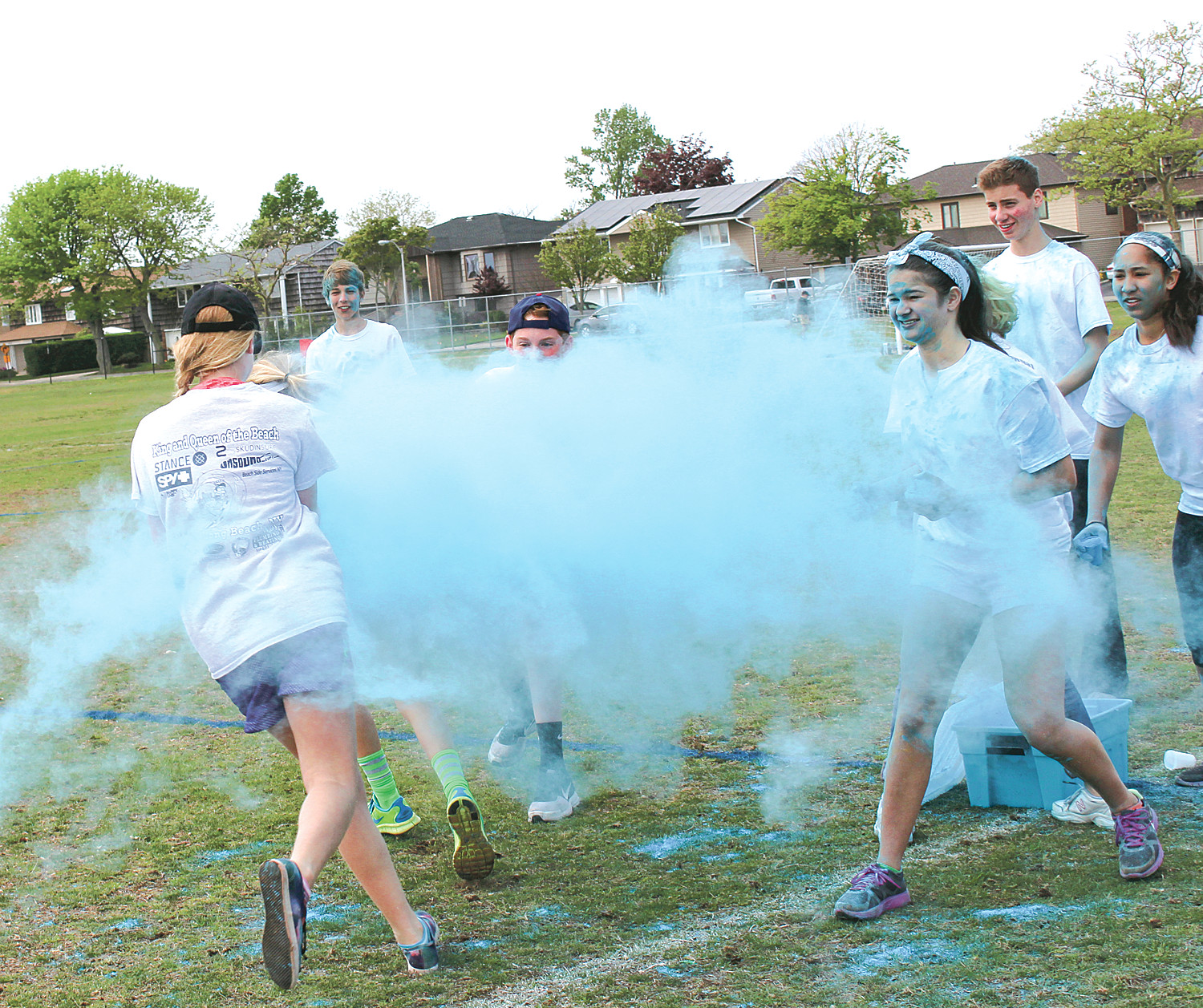 Clouds of all colors filled the air as the participants threw colored cornstarch as they crossed the finish line.