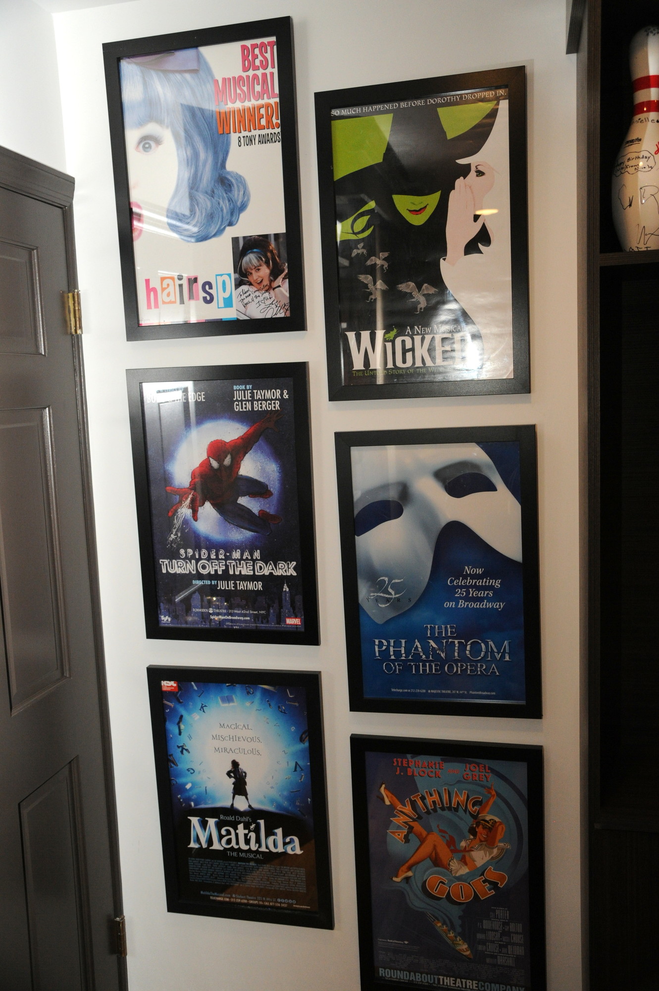Broadway posters of Robbie’s favorite shows decorate his new room