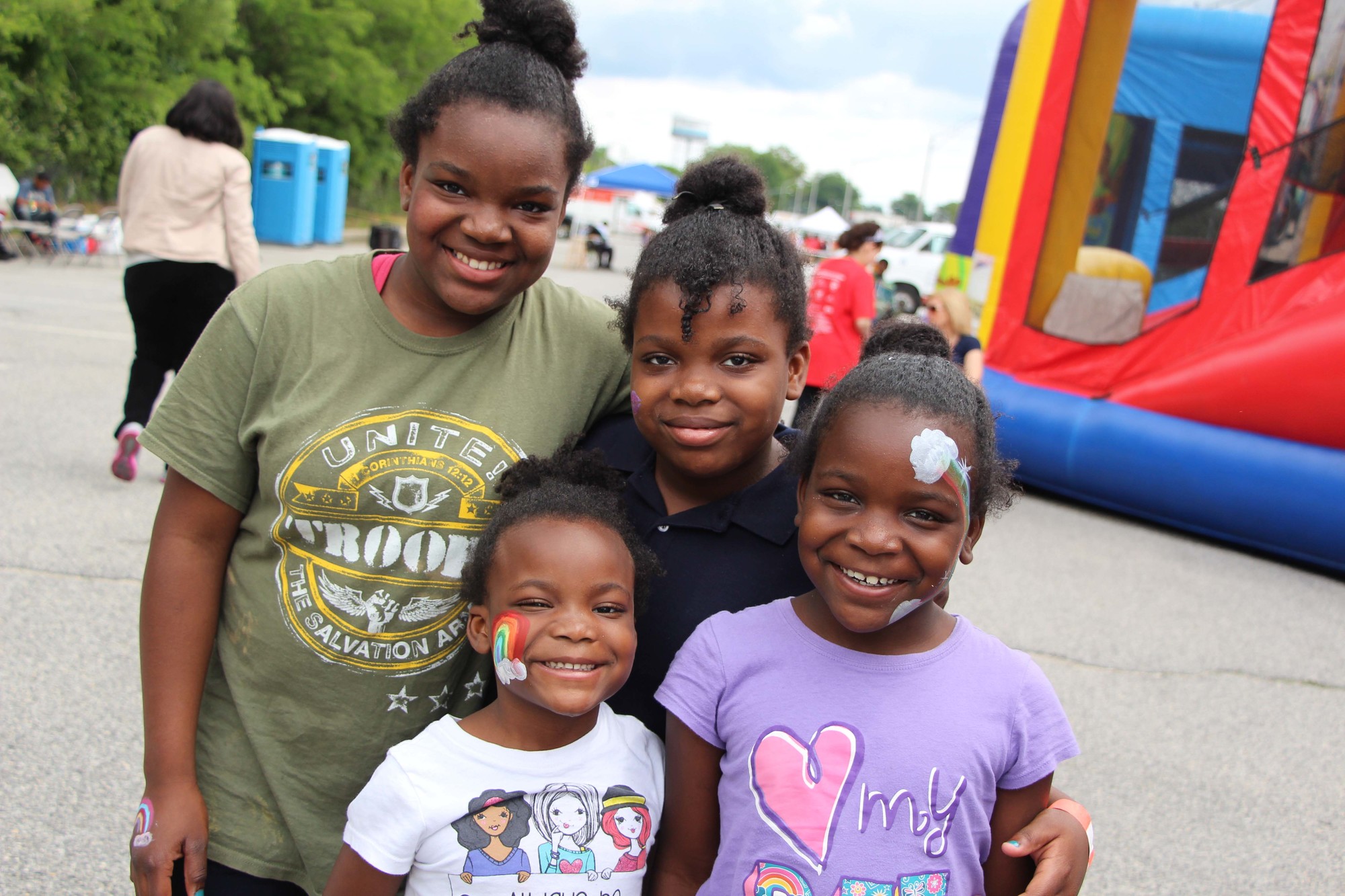The Sealy sisters, from left, Kaila, 10, Kirstein, 6, Coryne, 9, and Kamile, 8, had a fun time at the community block party.