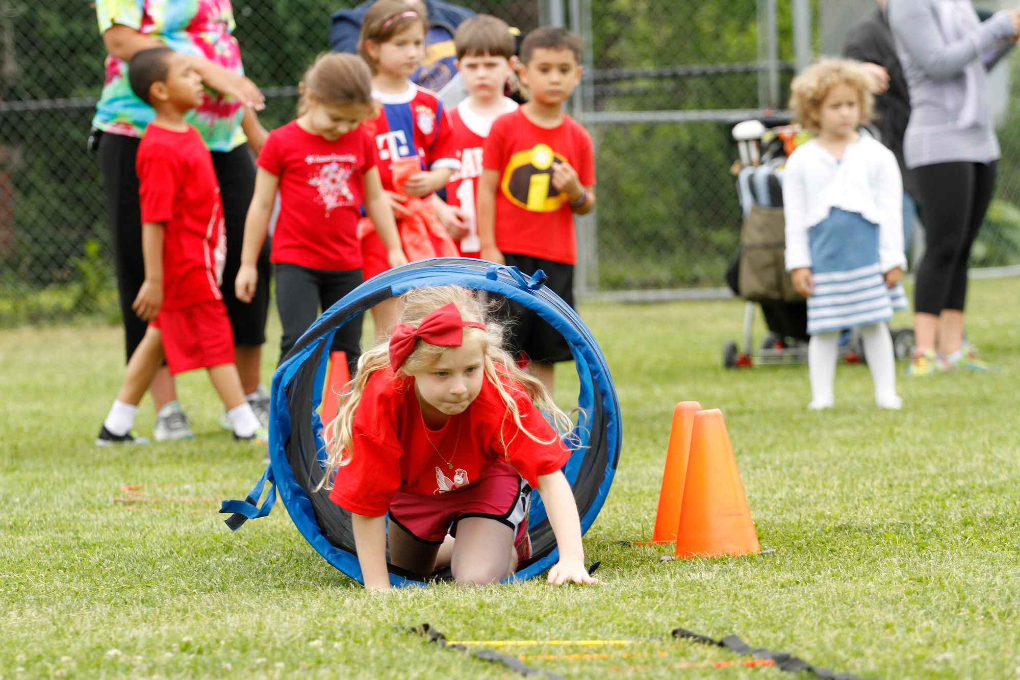 First grader Olivia Caracciolo raced through an obstacle course at Hewitt’s Field Day on June 5.