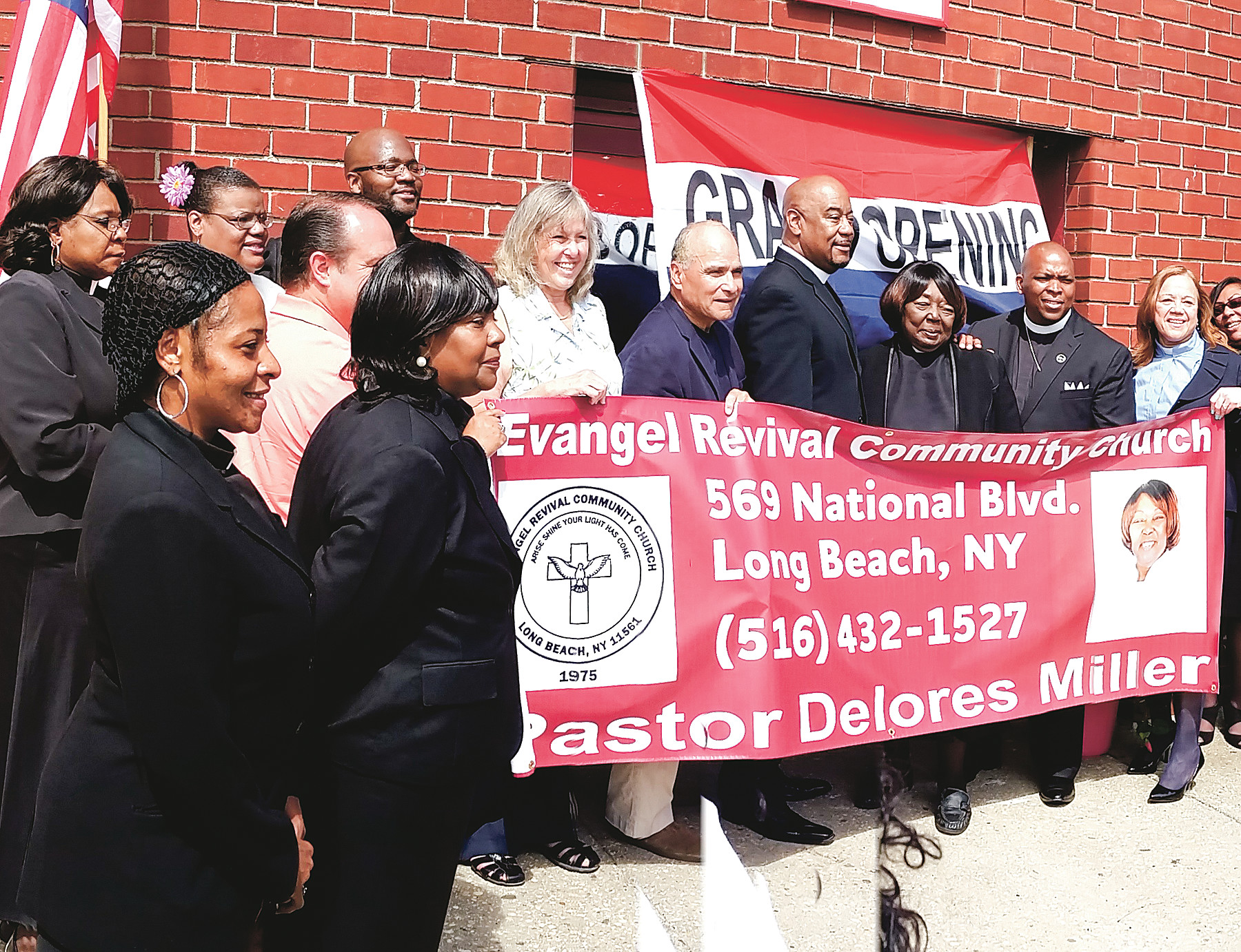 Courtesy Ronnie Myles
Rev. Delores Miller, third from right, was joined by local officials, clergy and residents at the reopening of the newly renovated Evangel Revival Community Church on May 30, more than two and a half years after Hurricane Sandy damaged the building.