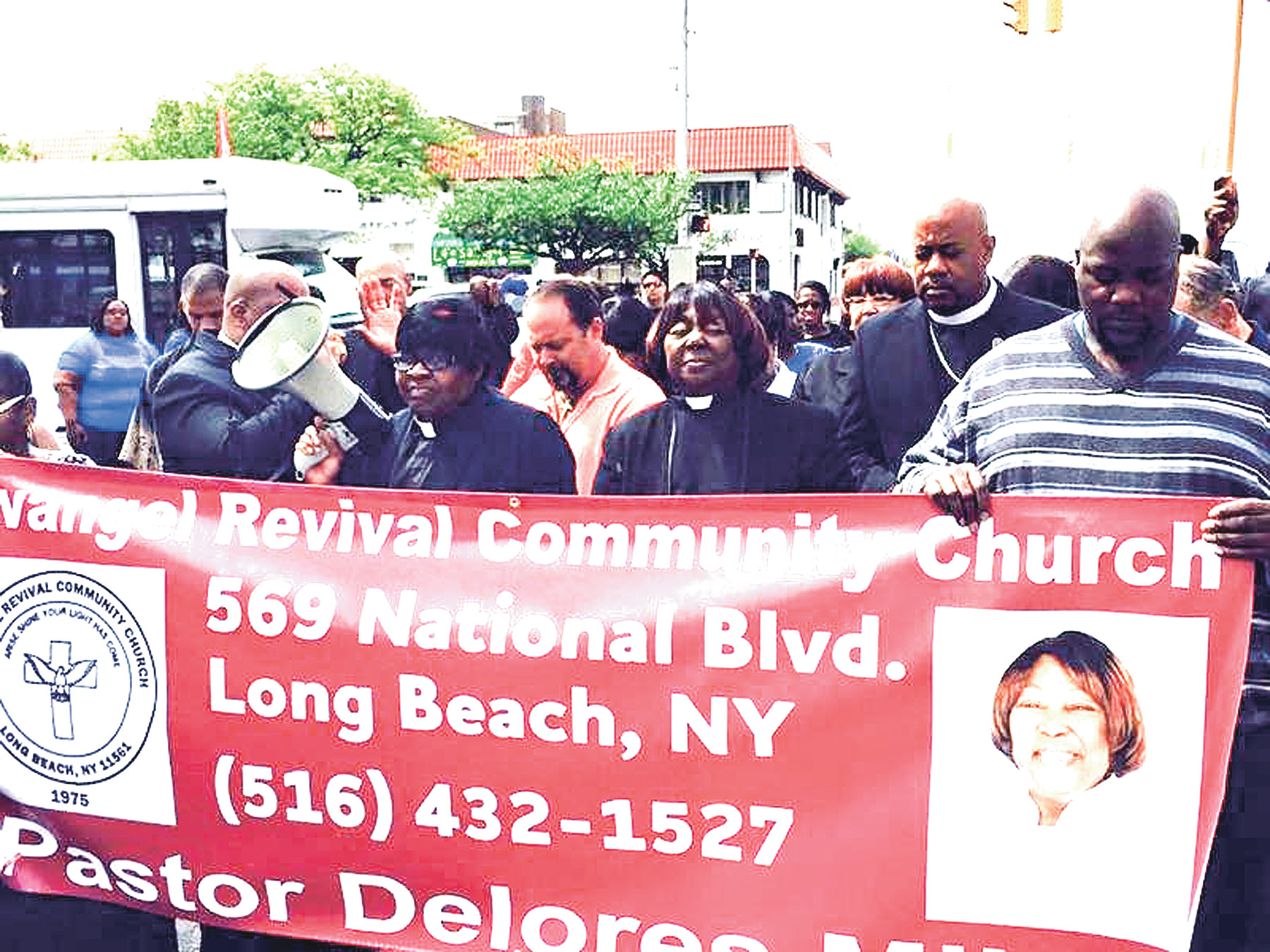 Members of the congregation led a march from Kennedy Plaza to the church on National Boulevard.