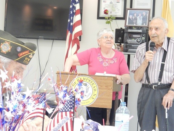 Carmine Cella was one of the many veterans who adressed the audience alongside Phyllis Caggiano, who hosted the ceremony at the East Meadow Senior Center on June 8.
