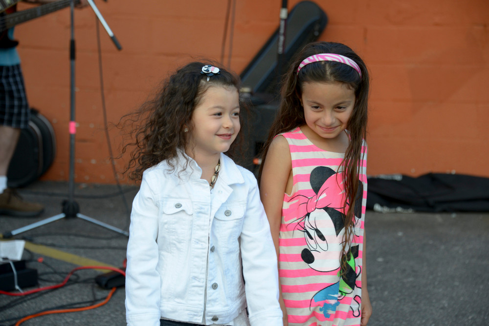 Madison Brennan age 5 and Zoey Kavadias age 6 dancing at rok bbq