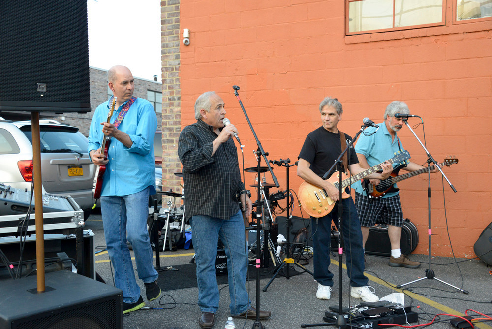 Owner Bob D'Urso  joins the band G-String  at ROK annual BBQ