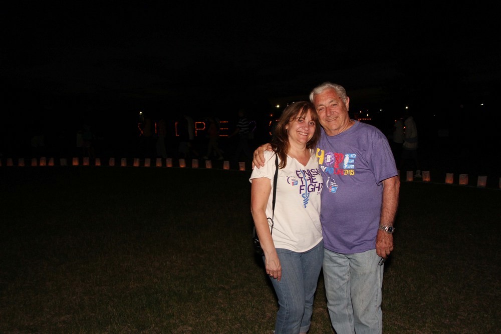 Thirteen-year cancer survivor 
Benjamin Serenita and his daughter Susan Barba walked the track at Relay.