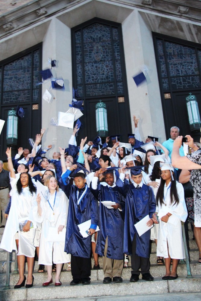 The Class of 2015 tossed their caps in the air in celebration.