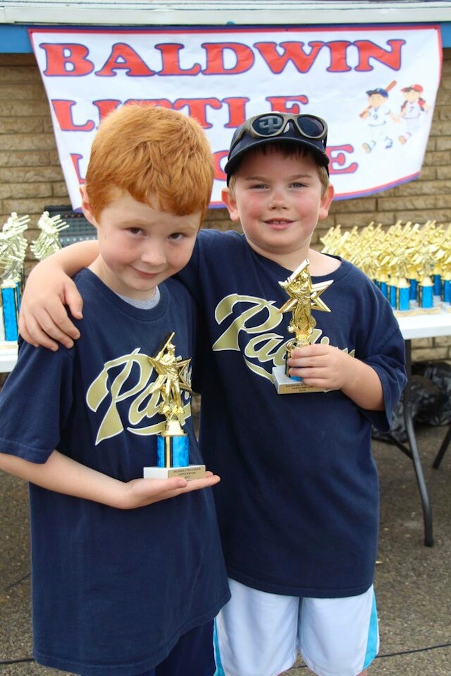Liam Mugford, 7, and Ryan Healey, 6, both from the Padres, received their trophies.