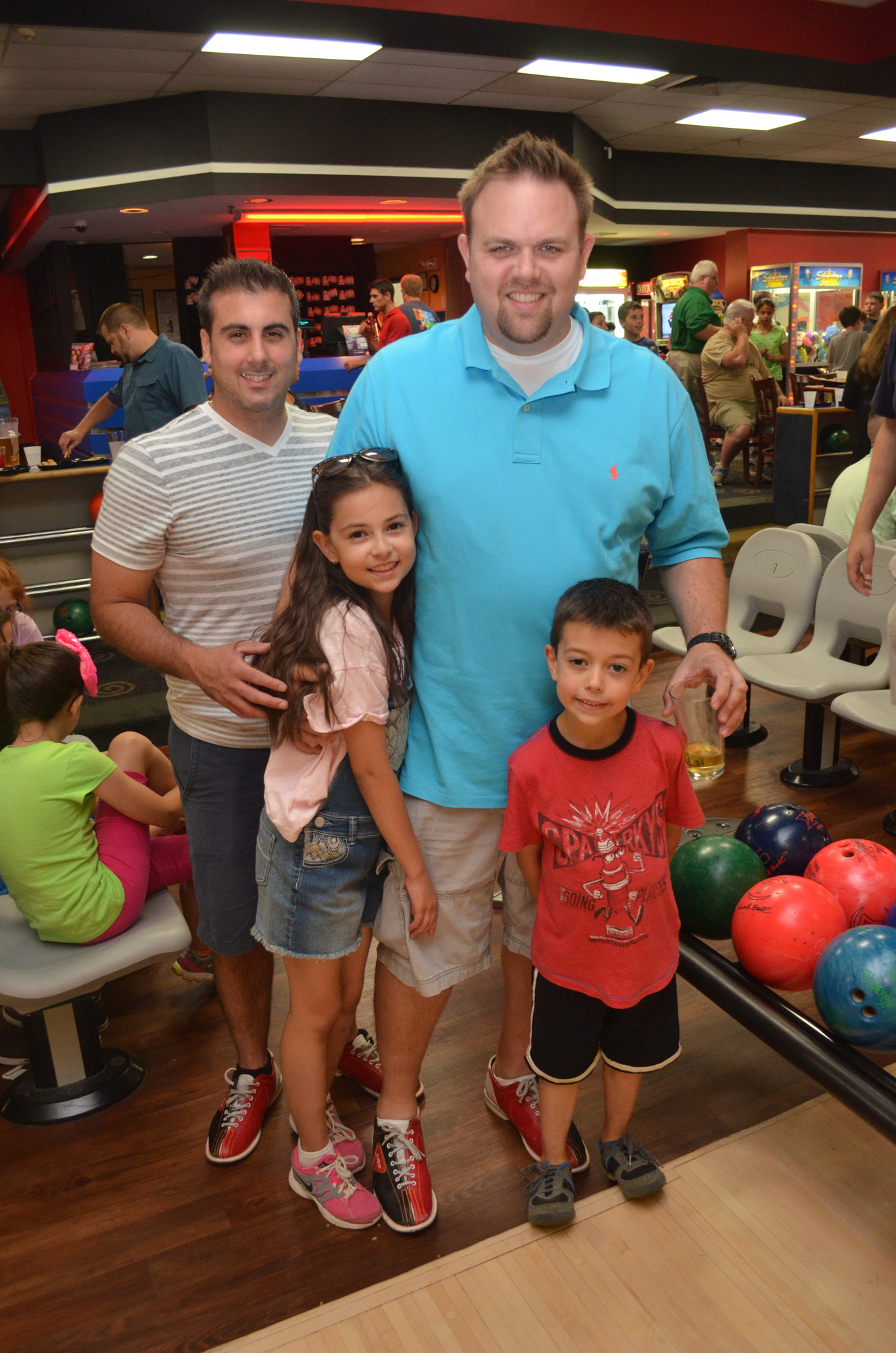 Peter Averaimo, left, with Melia Campbell, 8, Ed Campbell and Sebastian Campbell, 6.