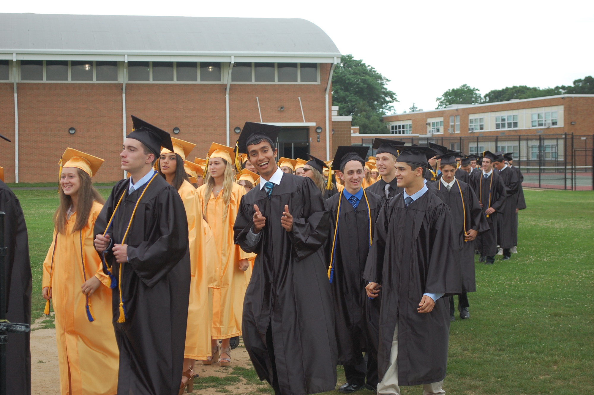 Vasu Joshi, center, and his fellow Wantagh High School graduates made their way to the football field for last Thursday evening’s ceremony.