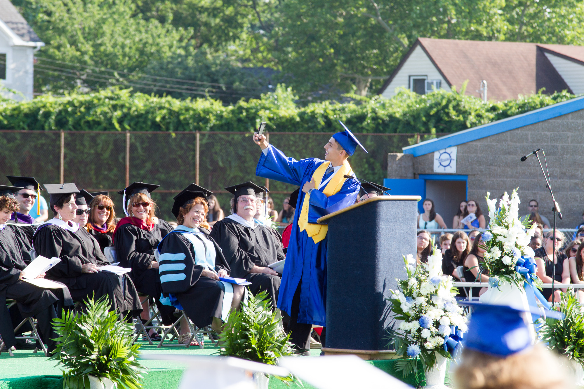 Valedictorian Alan Khaykin took a selfie during his speech at the graduation ceremony.