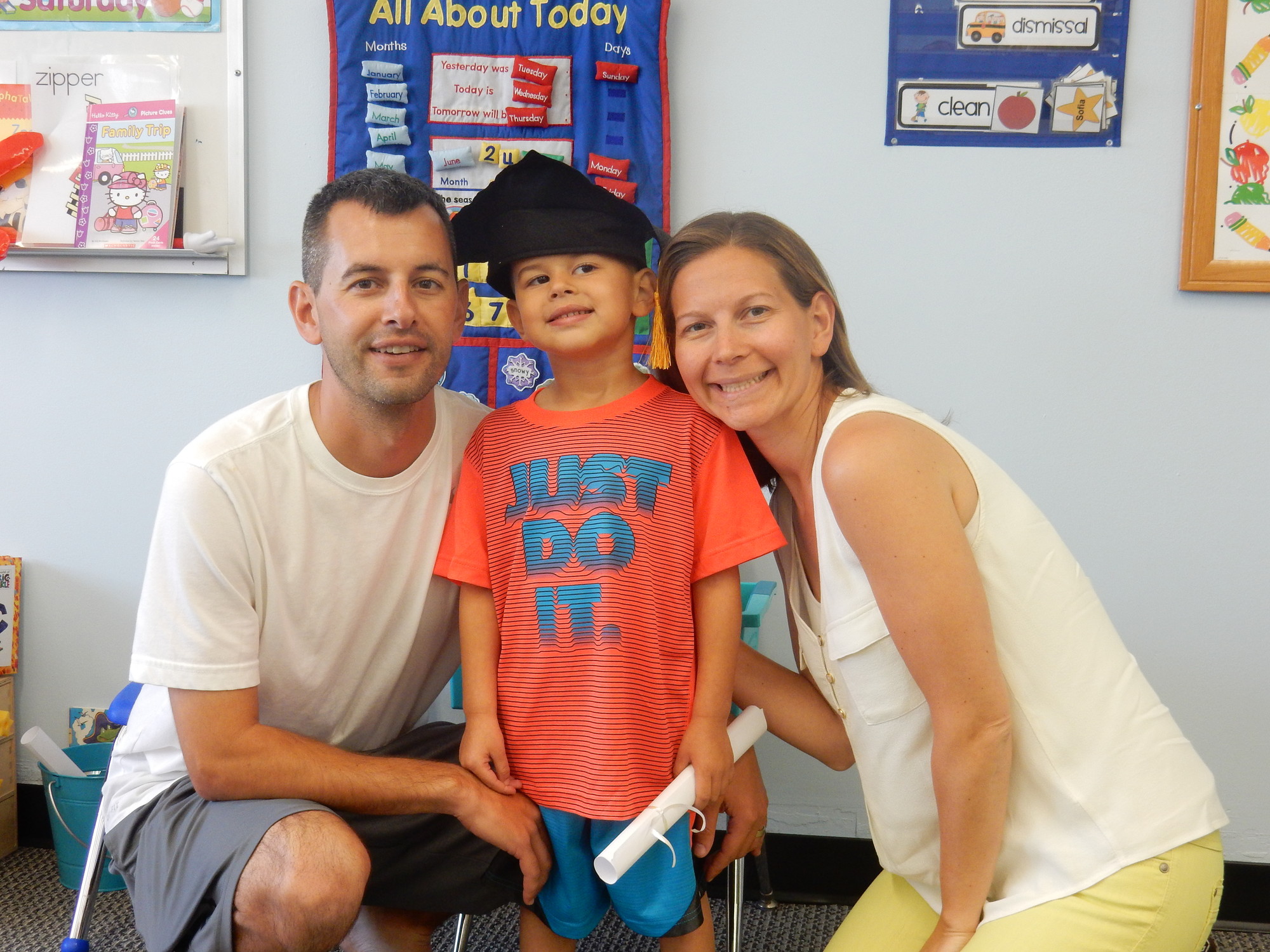 Cooper Scaturro, 4, with his parents Mike and Dana.