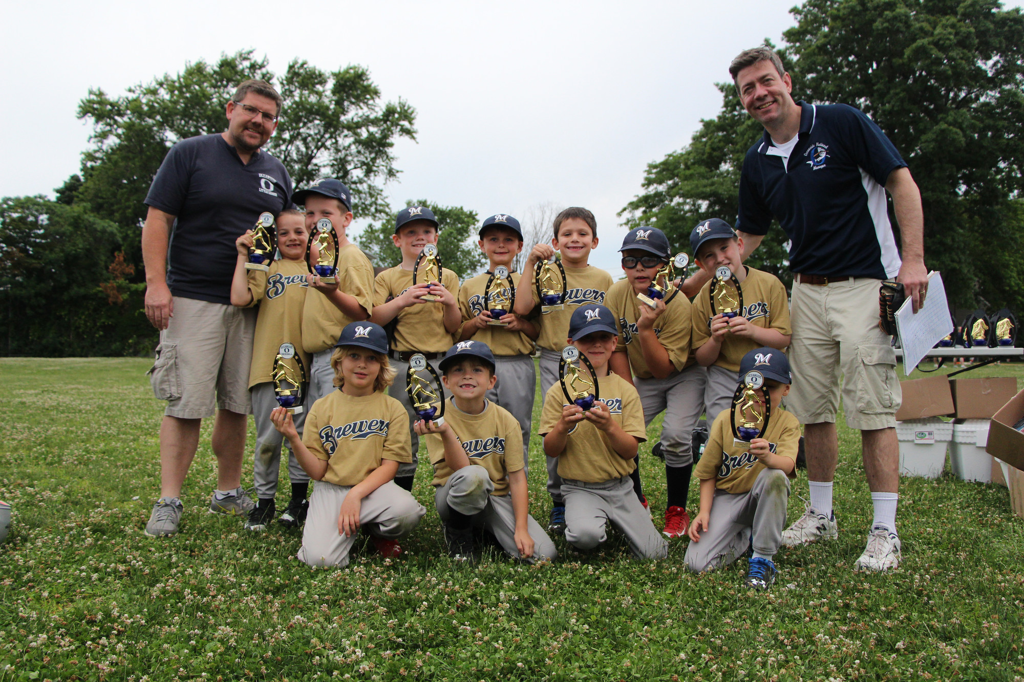 The Brewers little league team received their trophies with their coaches John Henderson and TJ O’Connor.