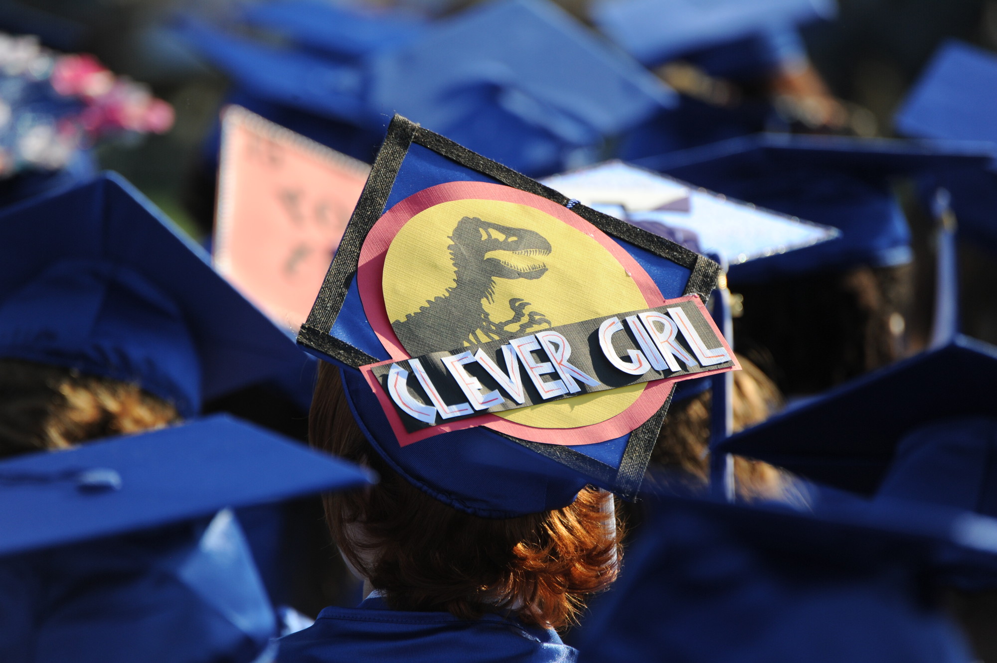 Graduates decorated their caps to stand out from the crowd and show off their personal styles.