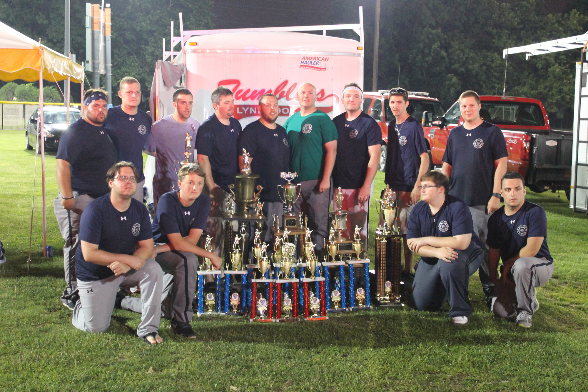 Lynbrook Fire Department’s Tournament Team, the Tumblers, posed with their winning trophies after the competition.