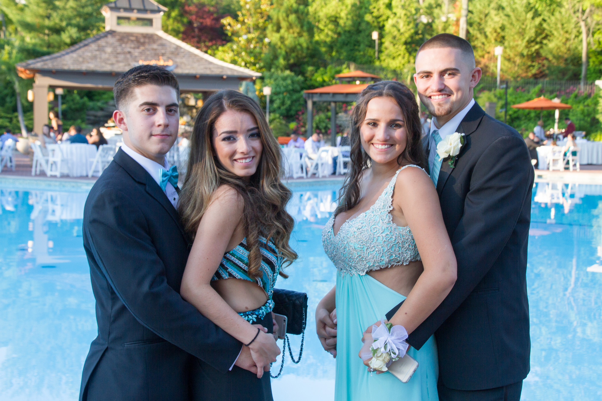 Charlie Ripepe, Christie Rodriquez, Amanda Rizzo, and Tim Nolan posed by the pool.