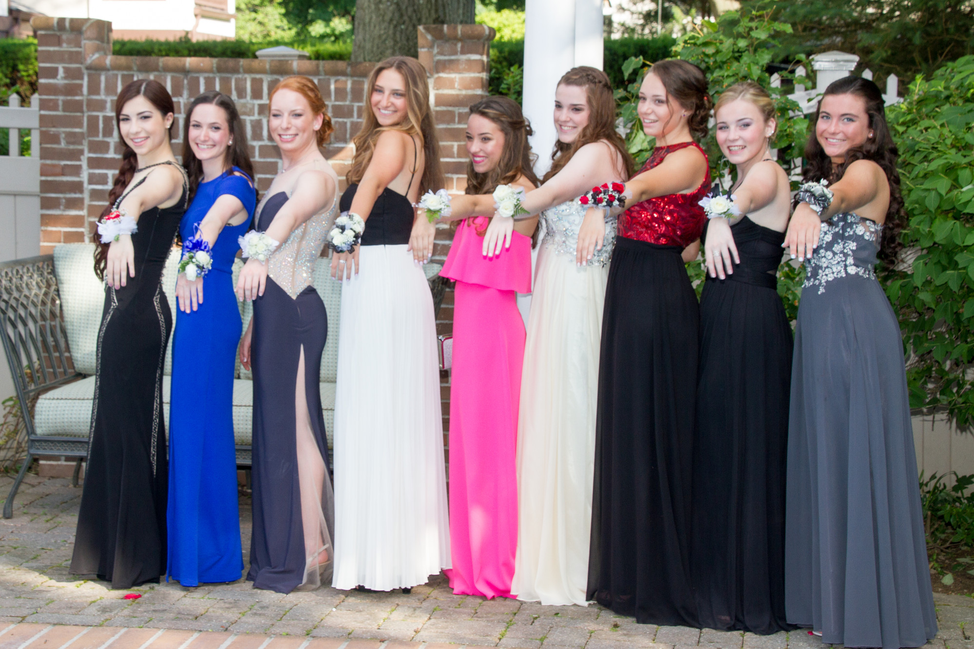Taylor Bologna, Dana Gelb, Jacquelyn Elfie, Dari Goldman, Juliana Denrich, Emily Brant, Jessica Scandiffio, Jessica Olson and Casey Backus showed off their corsages at a pre-prom party.