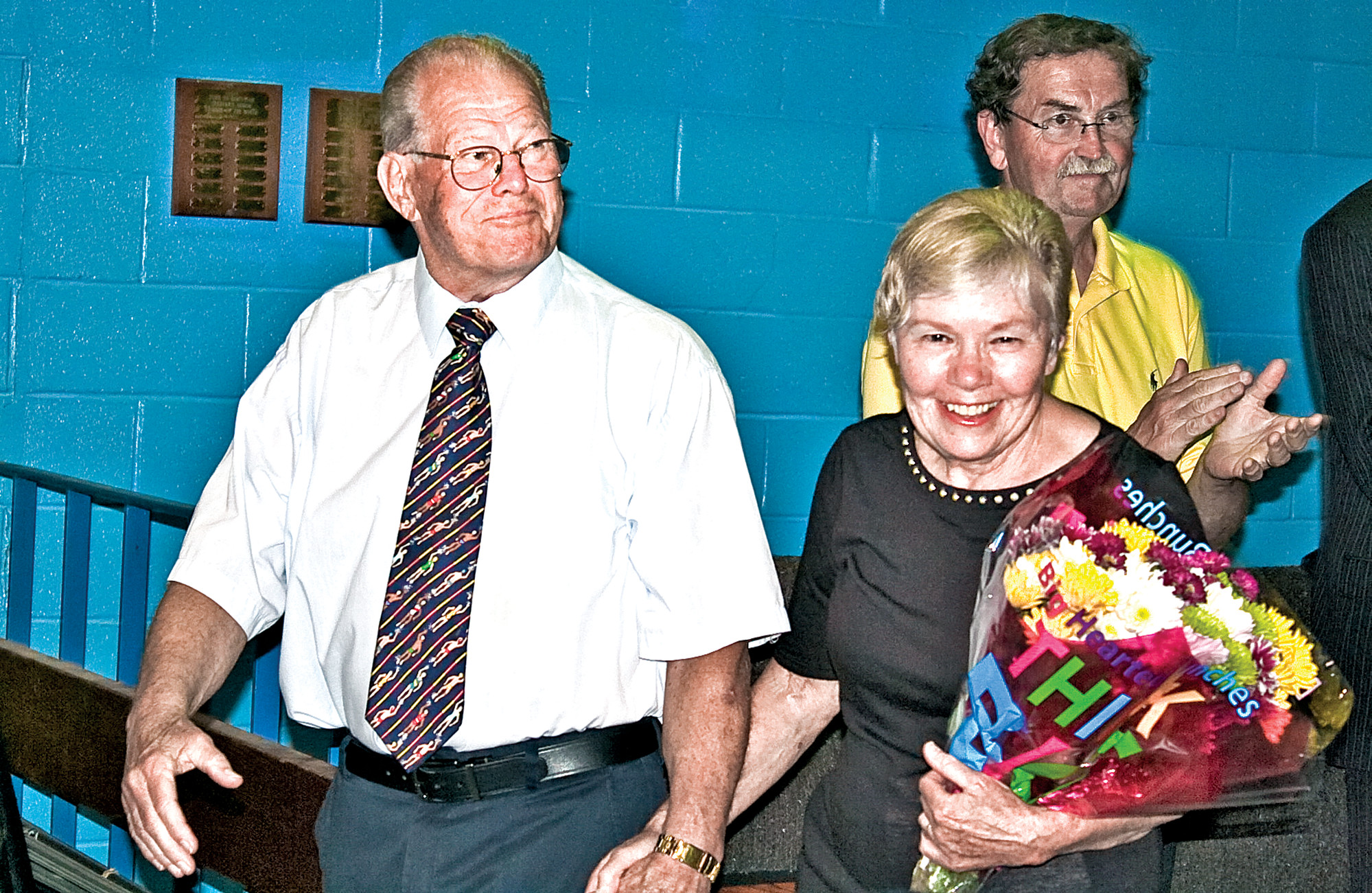 Woody and Ginny Davis at the dedication ceremony last year when the high school pool was renamed in his honor.