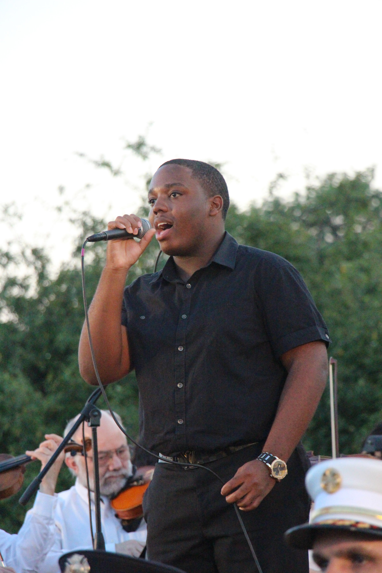 Craig Joseph opened up the concert while singing the national anthem.