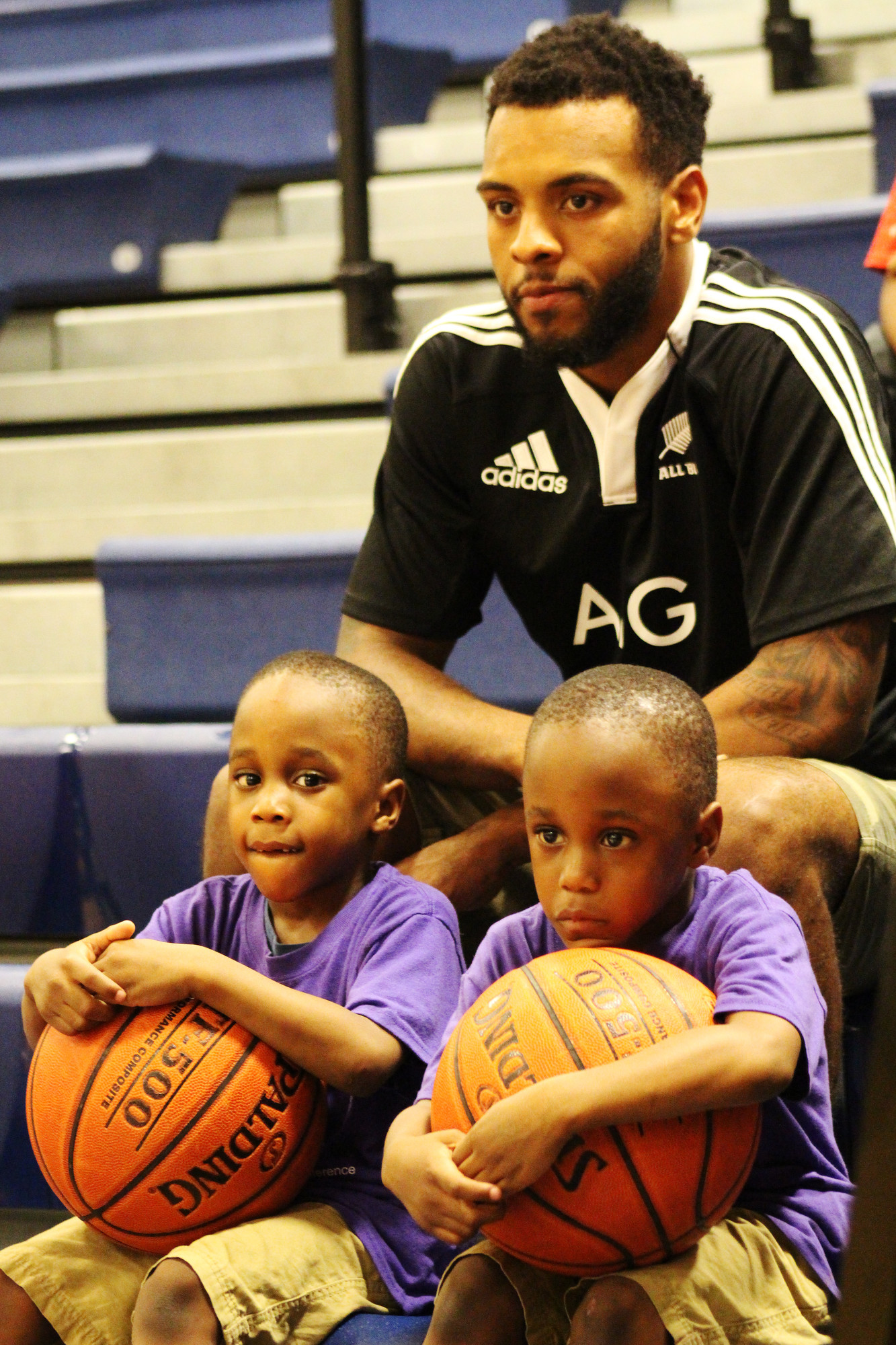 Javon and Javar Bussereth, 5-year-old twins, watched the games with their uncle, Andy Sejourne.